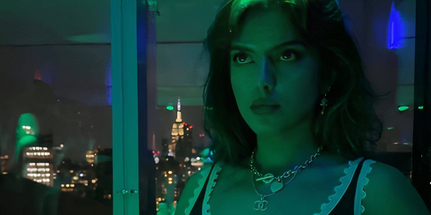 Sasha Bhasin olha para cima enquanto está sentado sob luz verde em Brave the Dark