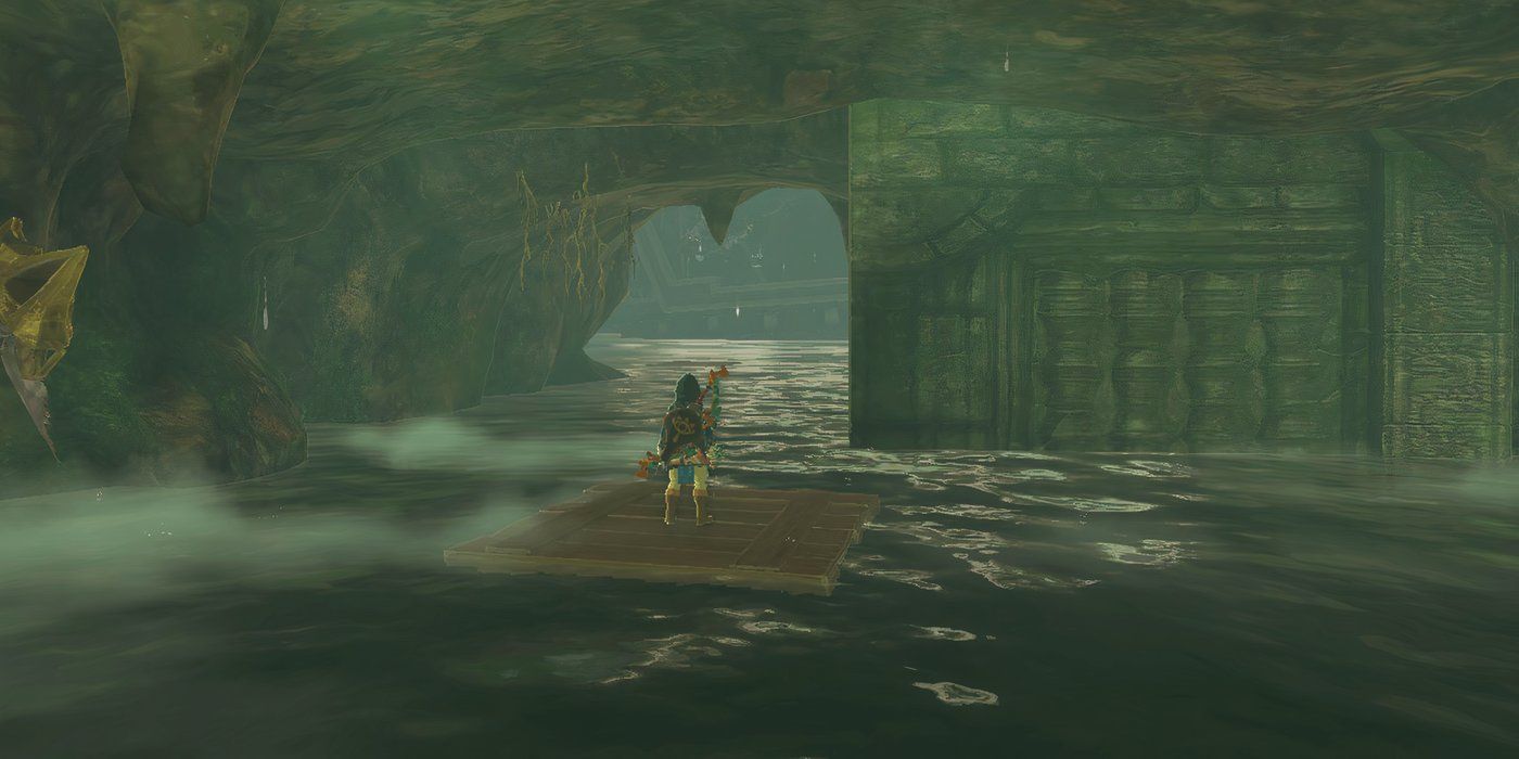 Link parado na entrada da caverna Cape Cales Cliffbase em Zelda Tears of the Kingdom