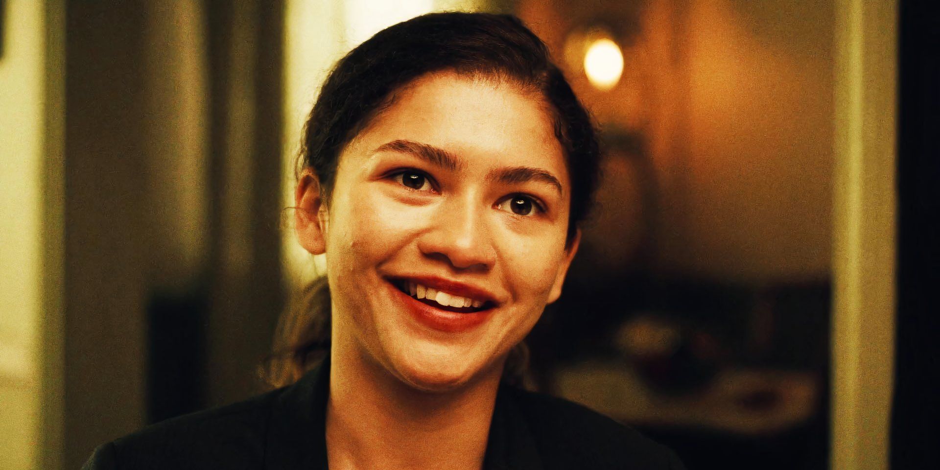 Zendaya smiles as Lou in Euphoria Season 2