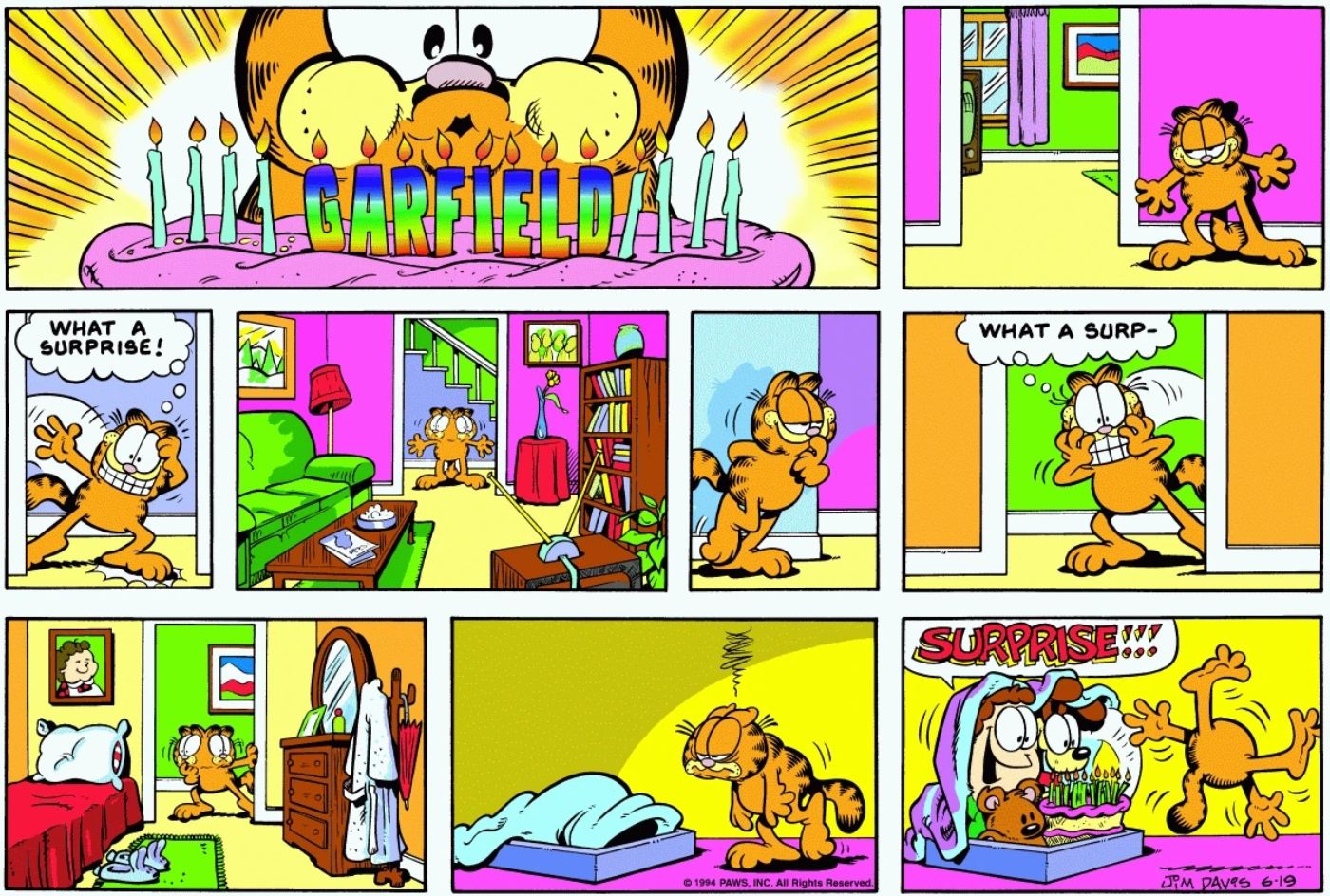 Garfield sendo surpreendido por Jon e Odie em seu aniversário.