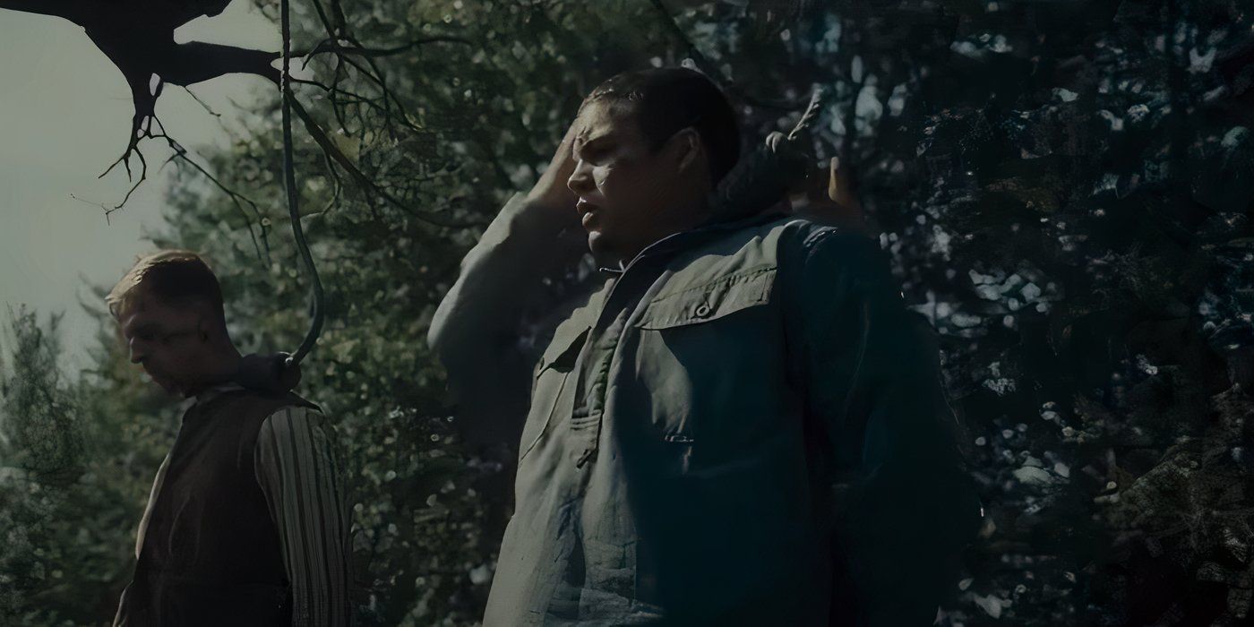 Sejanus, Josh Andrés Rivera, has a noose placed around his neck. Sejanus is dressed in gray.