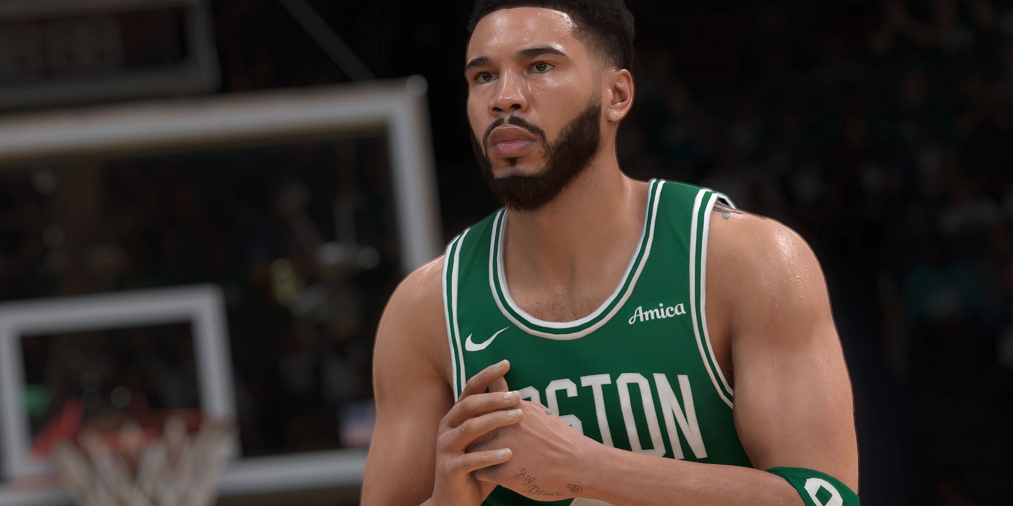 Jayson Tatum, do NBA 2K25, segurando as mãos juntas em uma quadra de basquete. 