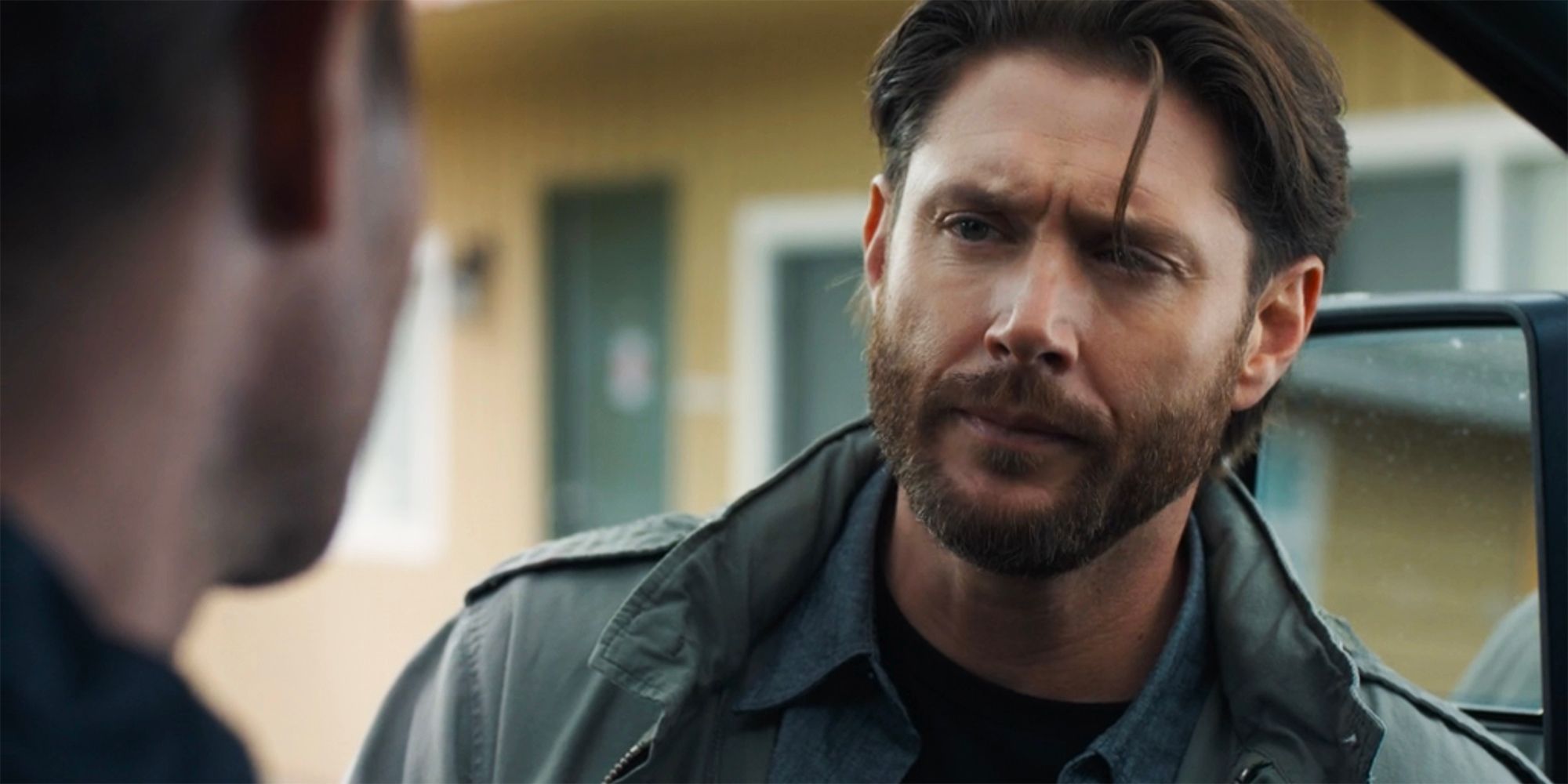 A close up of Jensen Ackles as Russell Shaw looking confused in Tracker