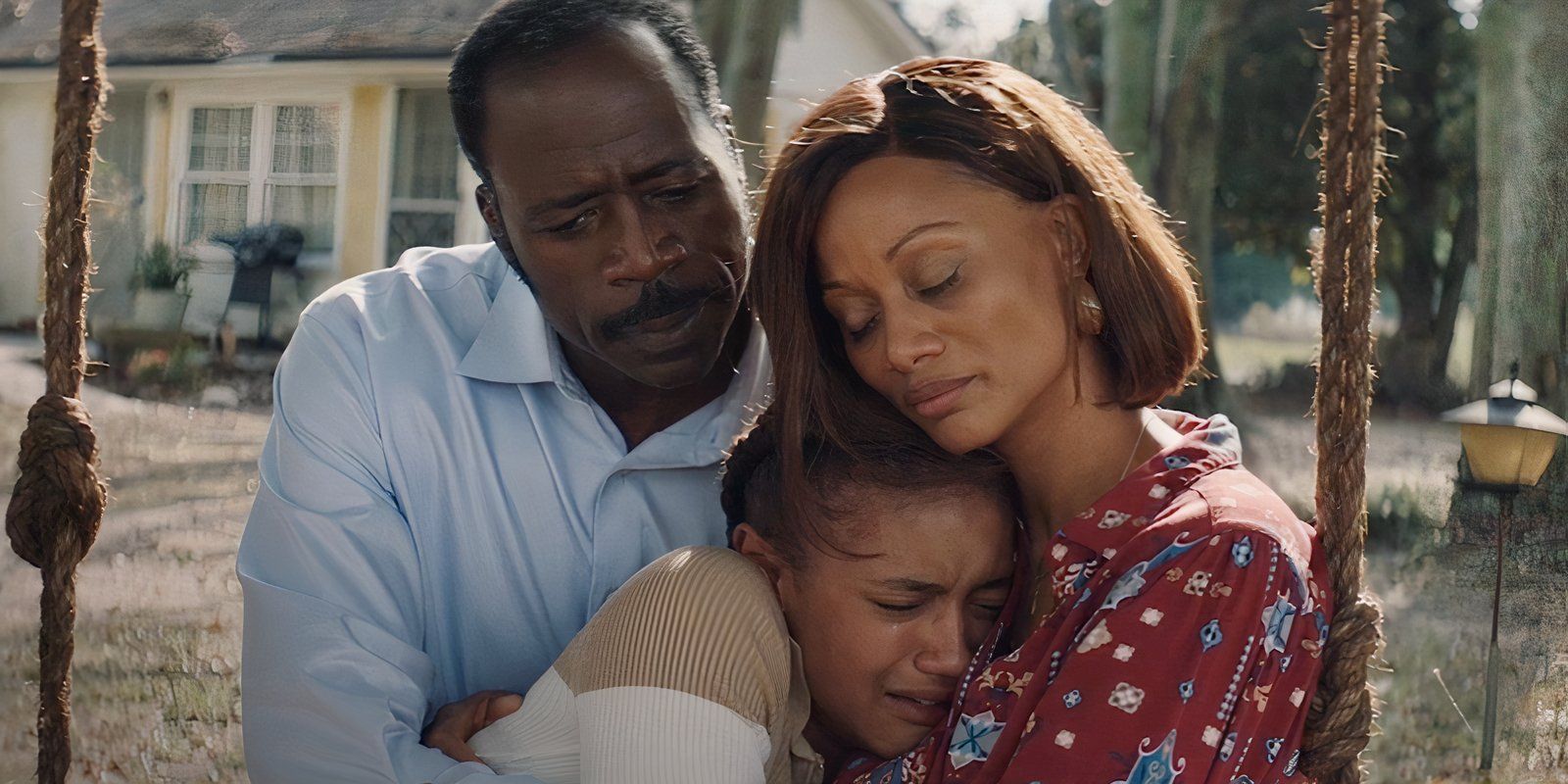 A family hugging in Sound of Hope The Story of Possum Trot