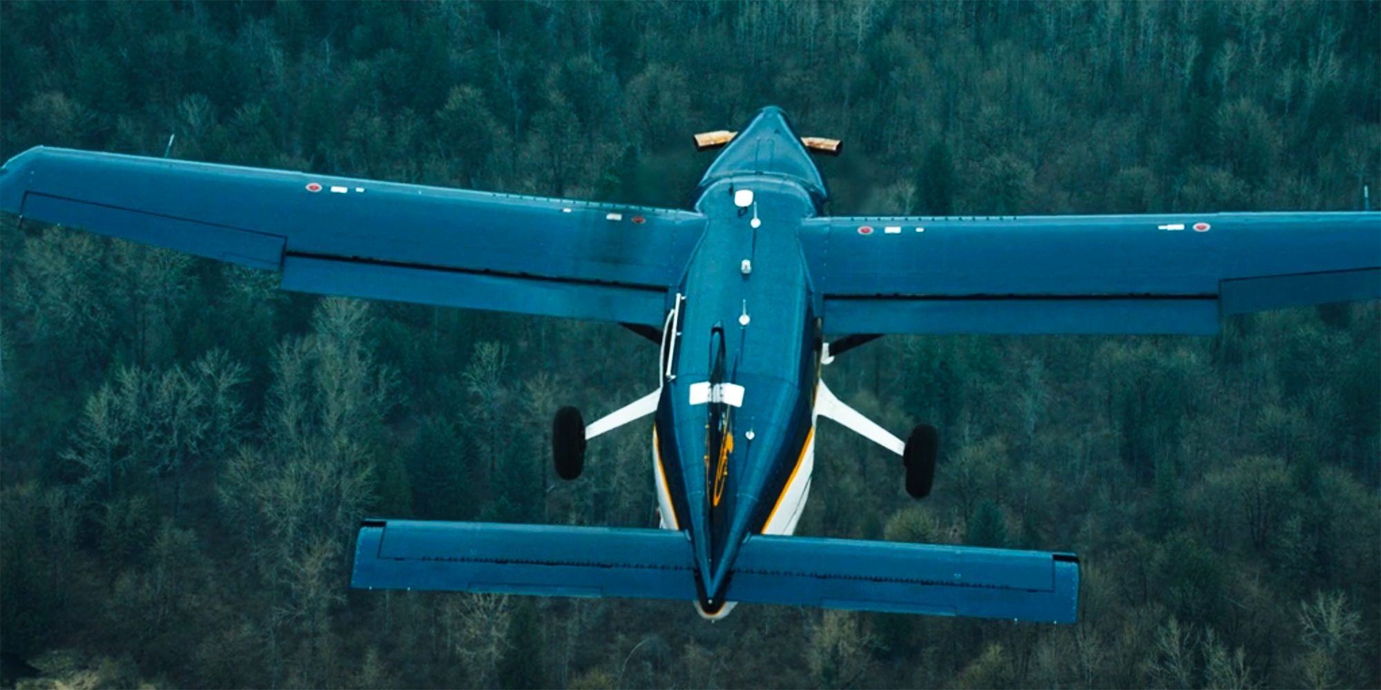 A plane flying in the mountains in the Tracker episode Into the Wild