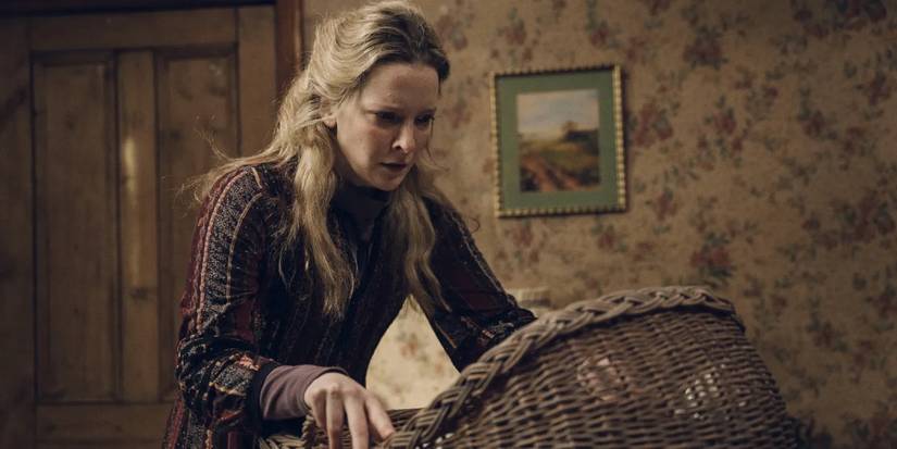 Morfydd Clark looking shocked in Starve Acre (2024)