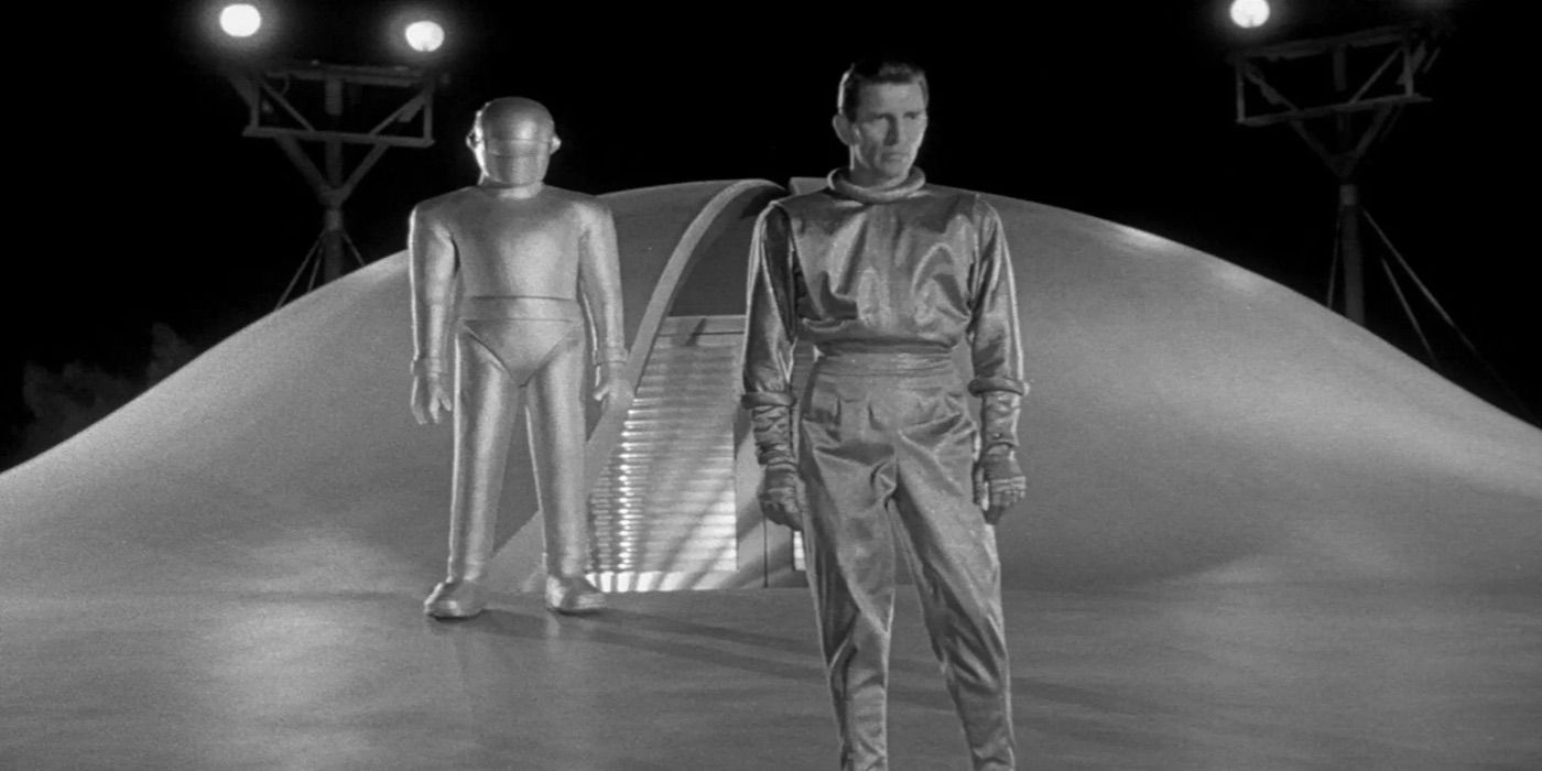 Gort, played by actor Lock Martin, and Klaatu, played by actor Michael Rennie, in The Day the Earth Stood Still (1951)