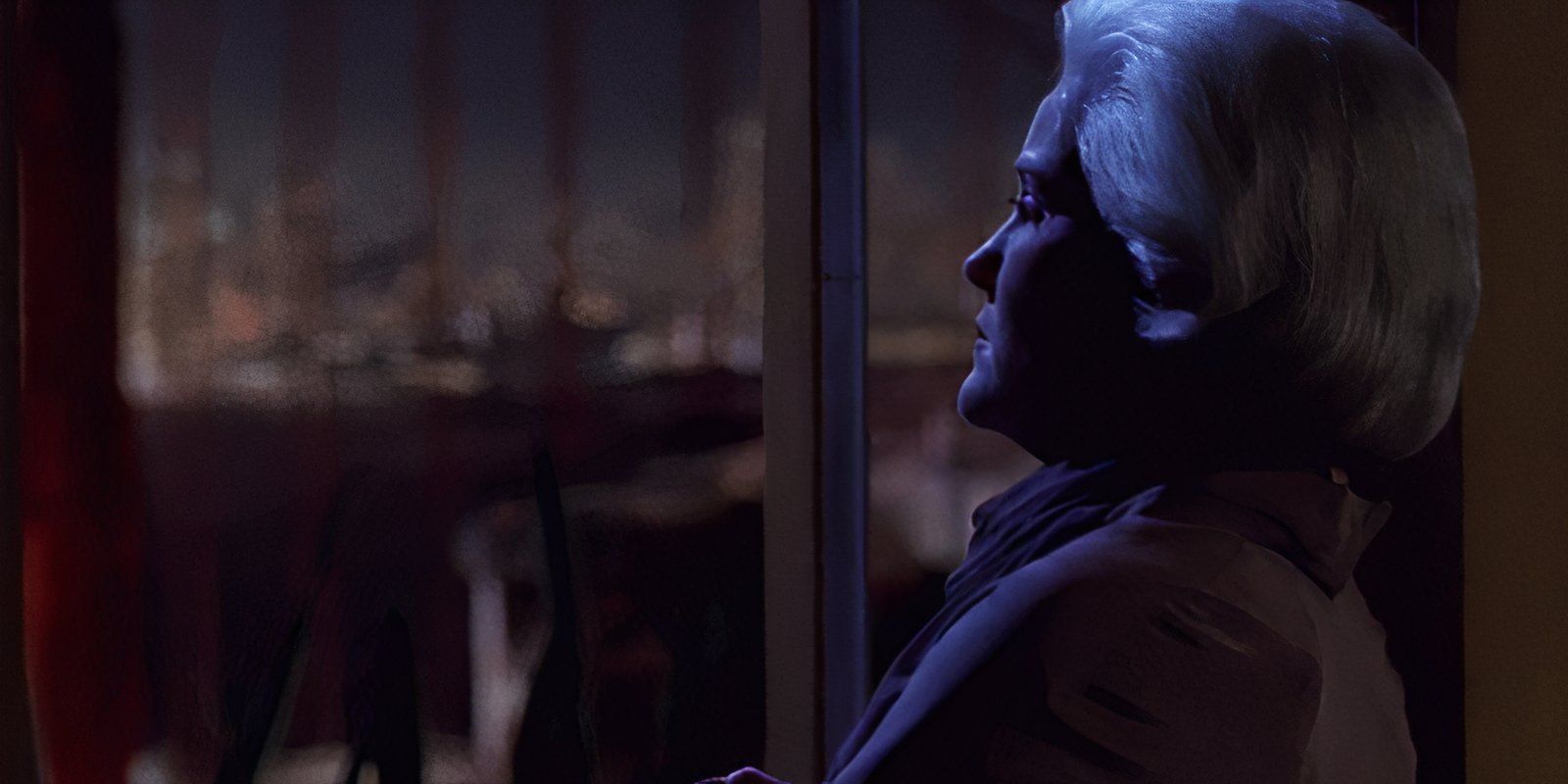 Admiral Janeway (Kate Mulgrew) looks wistfully out the window in Star Trek Voyager Endgame