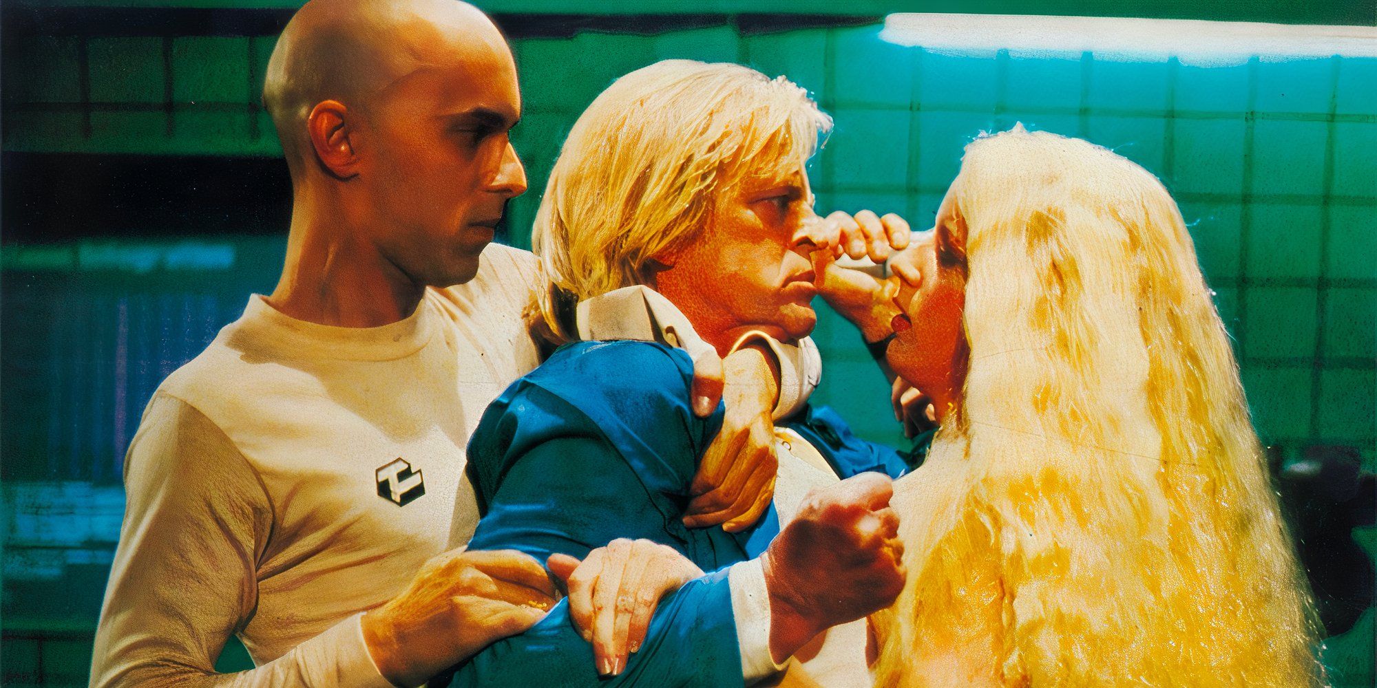 Three characters fighting in the movie Android from 1982