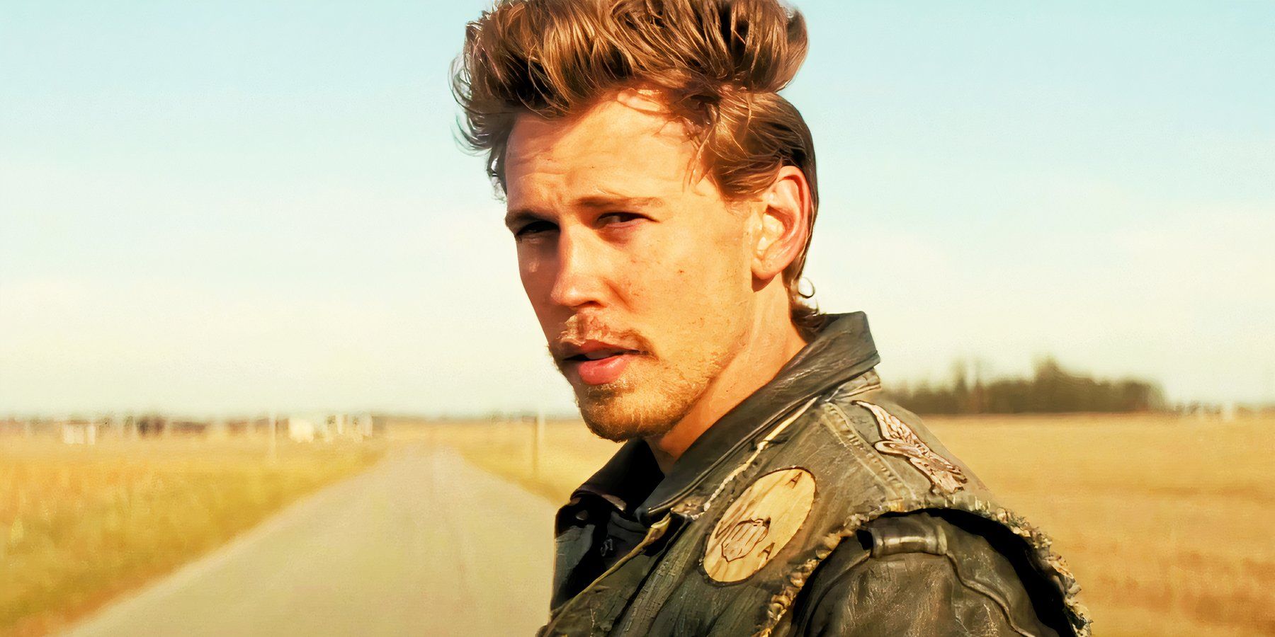 Austin Butler como Benny em The Bikeriders