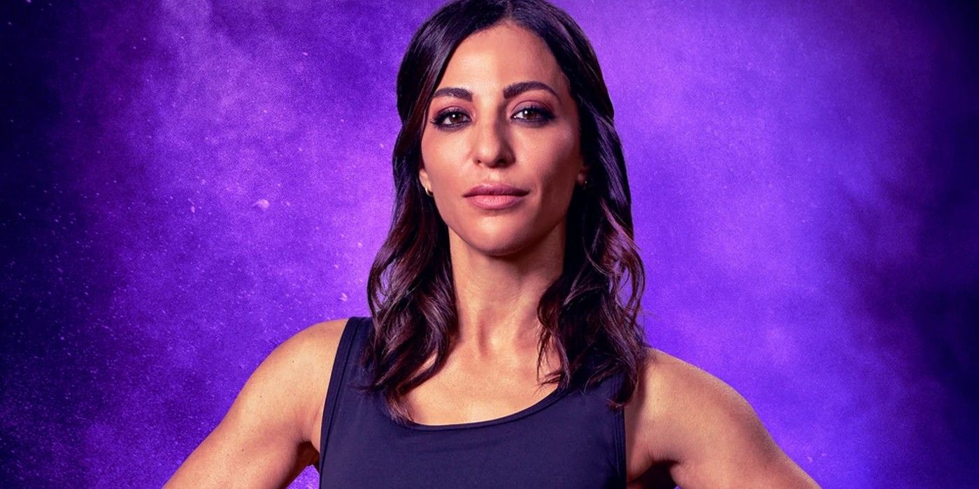 Aviv Melmed from The Challenge Season 40 looking intensely at the camera in front of a purple background.