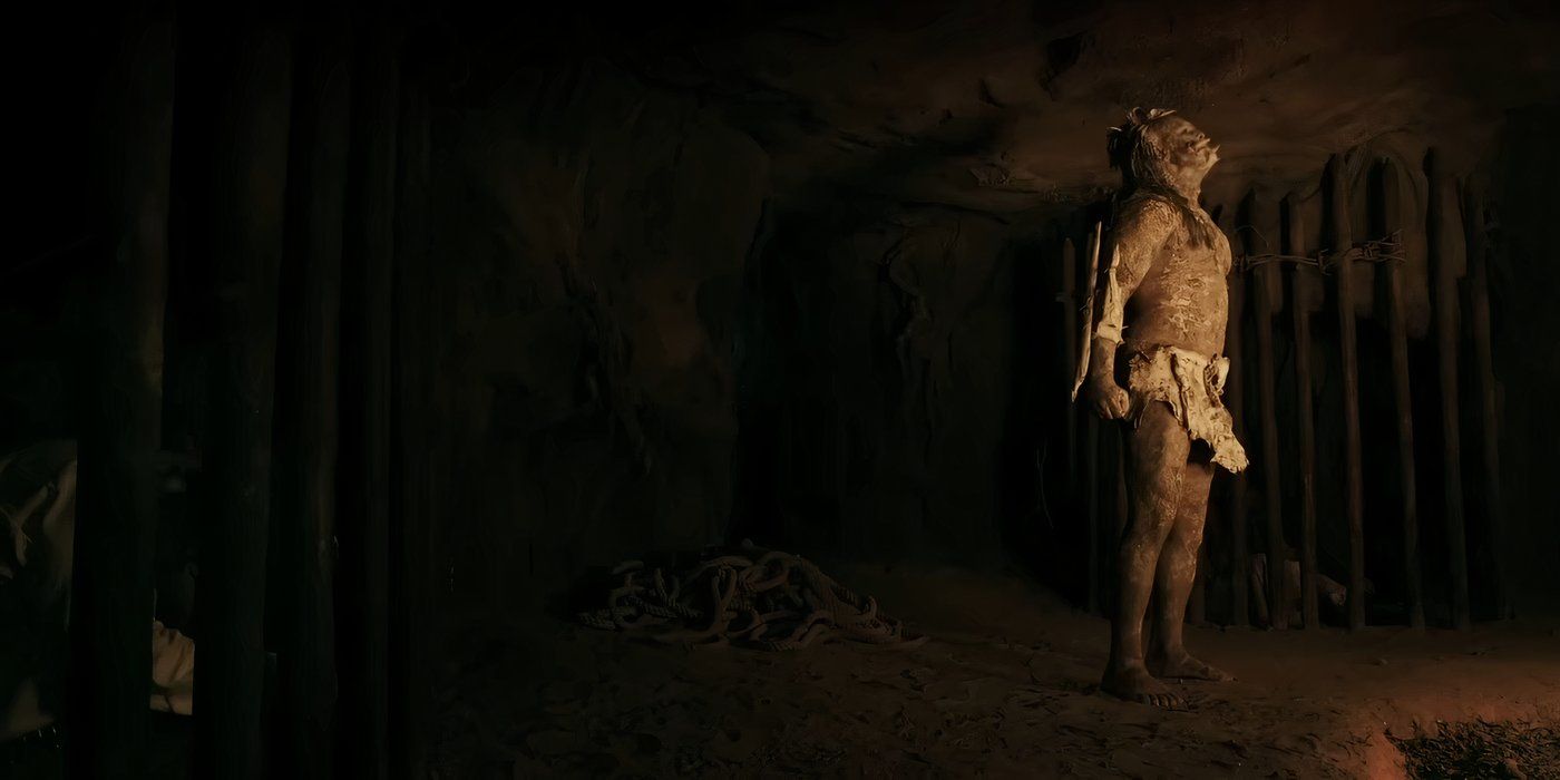 Un miembro de una tribu troglodita se encuentra en una cueva oscura en Bone Tomahawk.