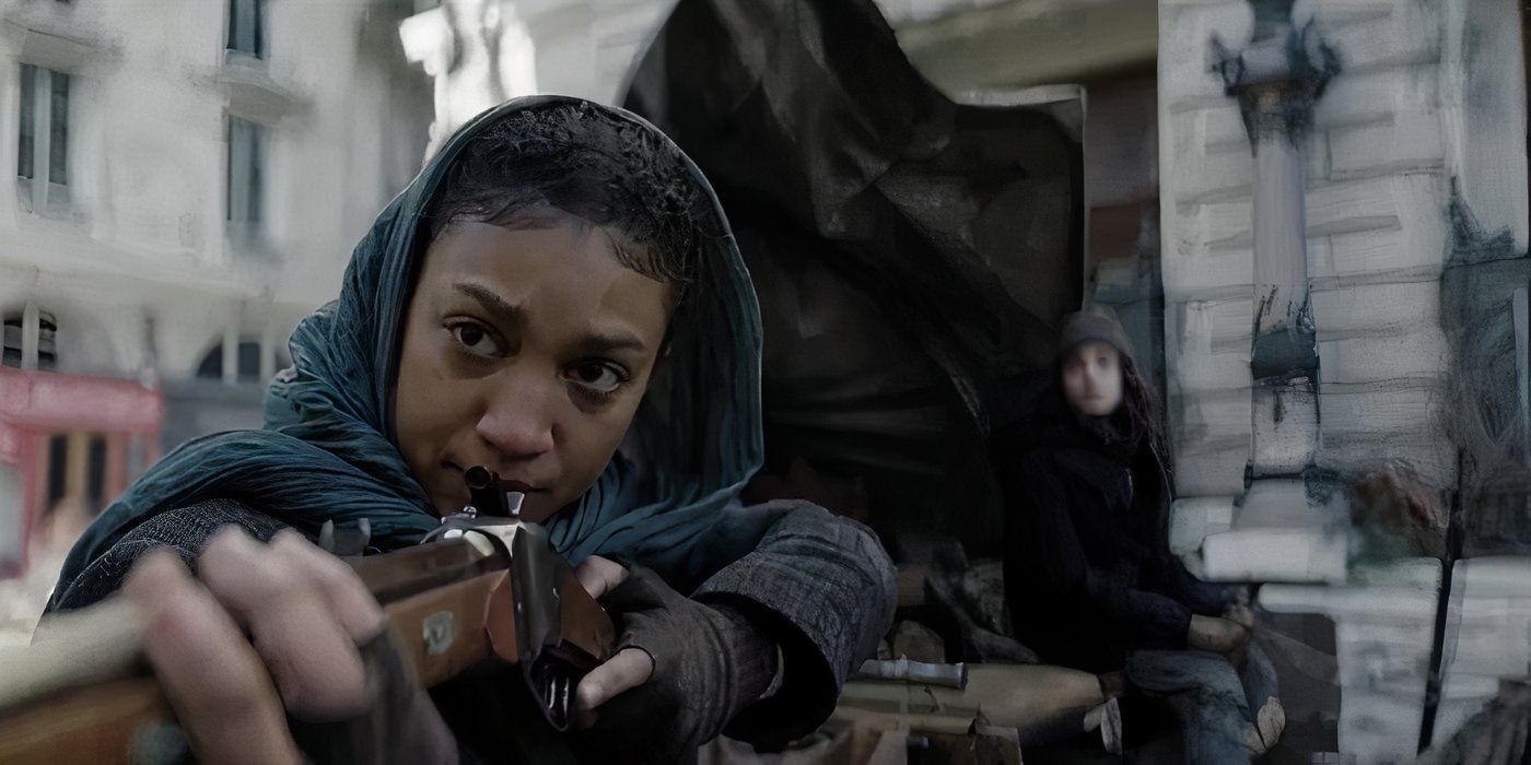 Sylvie (Laika Blanc Francard) points a gun at someone offscreen in The Walking Dead: Daryl Dixon