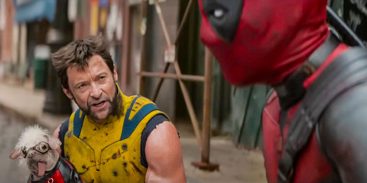 Wolverine looking at Deadpool while holding Dogpool in Deadpool & Wolverine