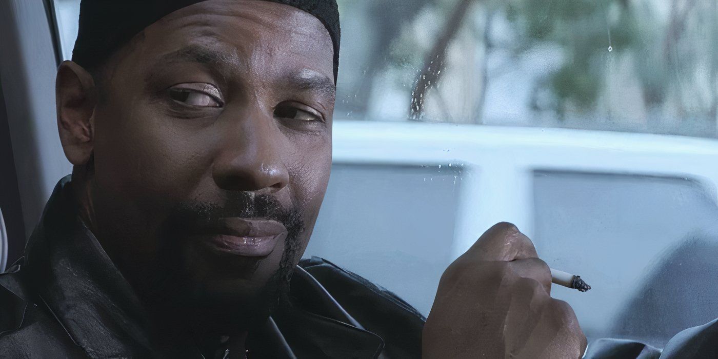 Denzel Washington as Alonzo smirking and holding a cigarette in Training Day