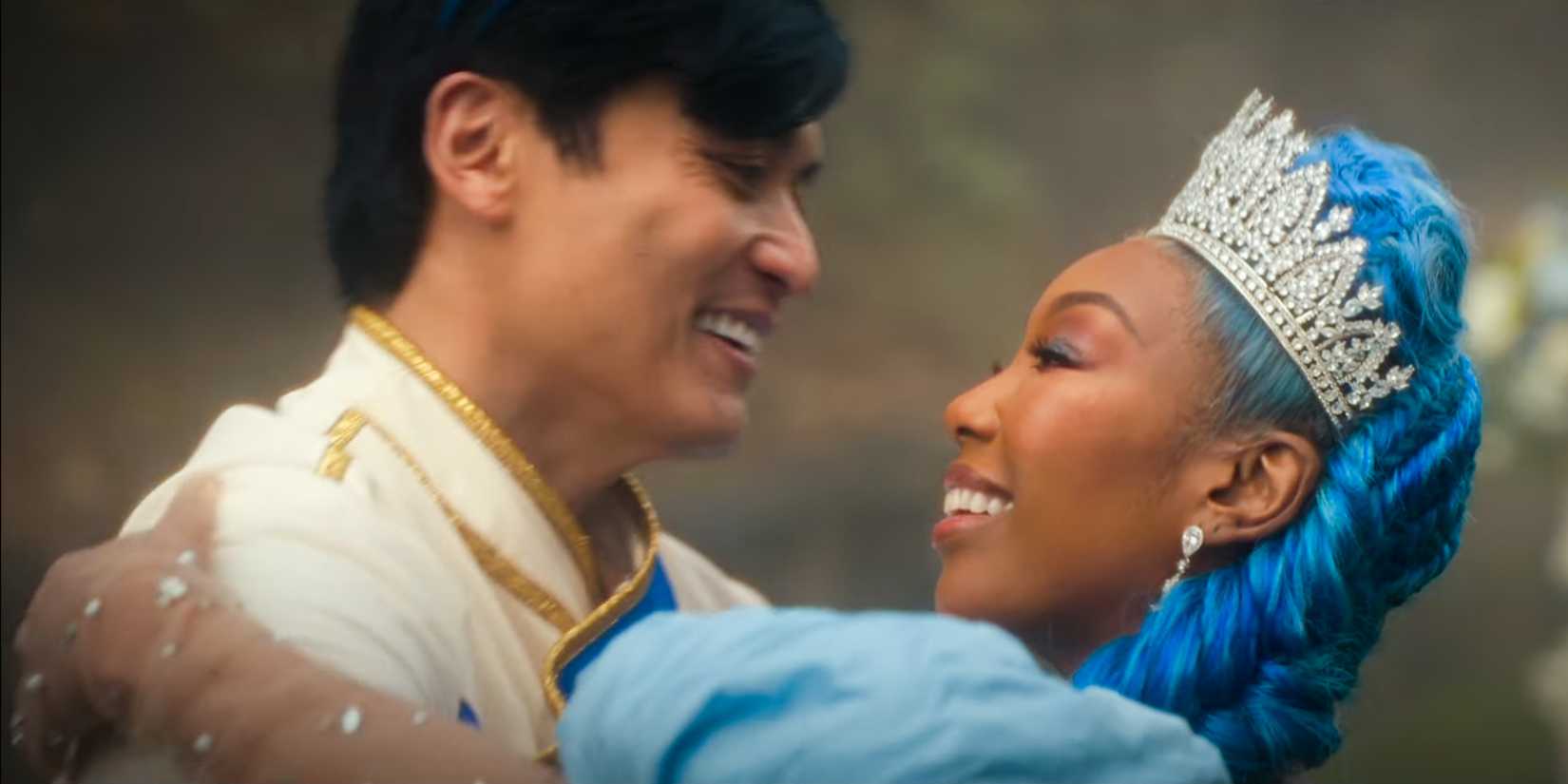 King Charming and Cinderella embrace and smile in Descendants: Rise of Red