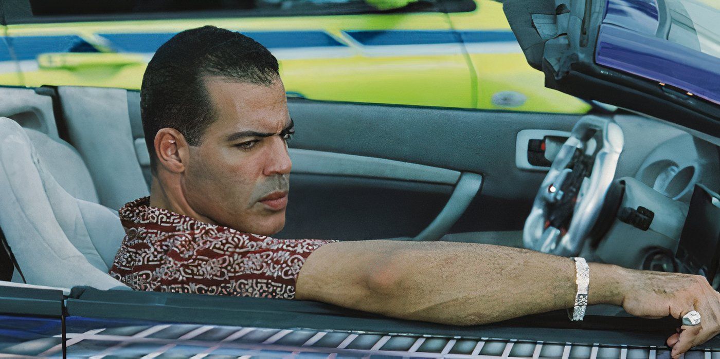 Roberto Sanchez looks furious while sitting in the passenger seat of 2 Fast 2 Furious