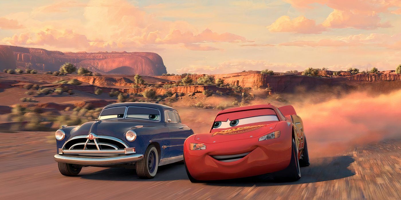 Doc (Paul Newman) racing alongside Lightning McQueen (Owen Wilson) in Cars.