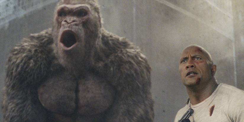 Dwayne Johnson as Davis Okoye next to George in Rampage