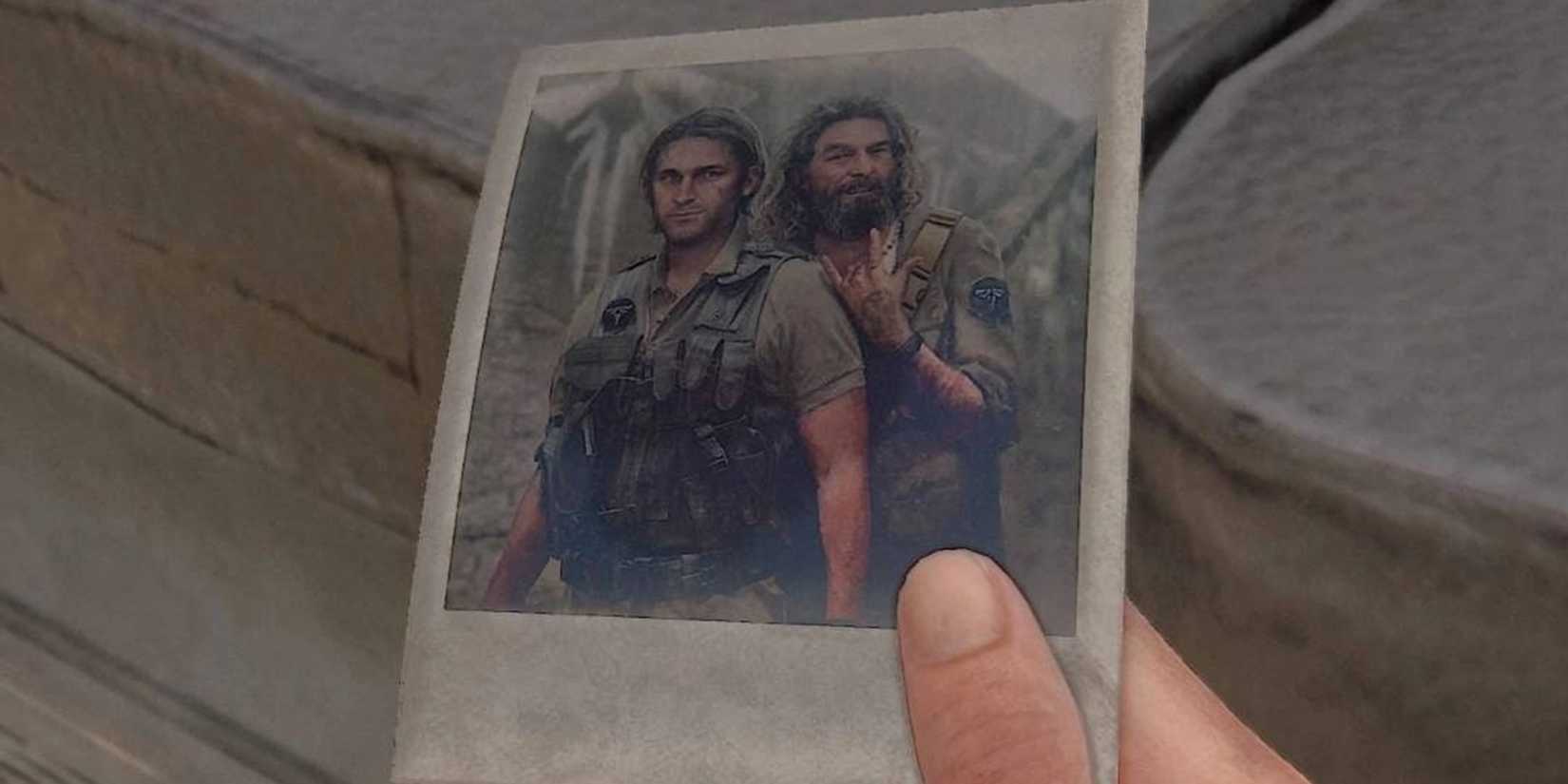 Ellie holds a picture of Eugene and Tommy in The Last of Us Part II