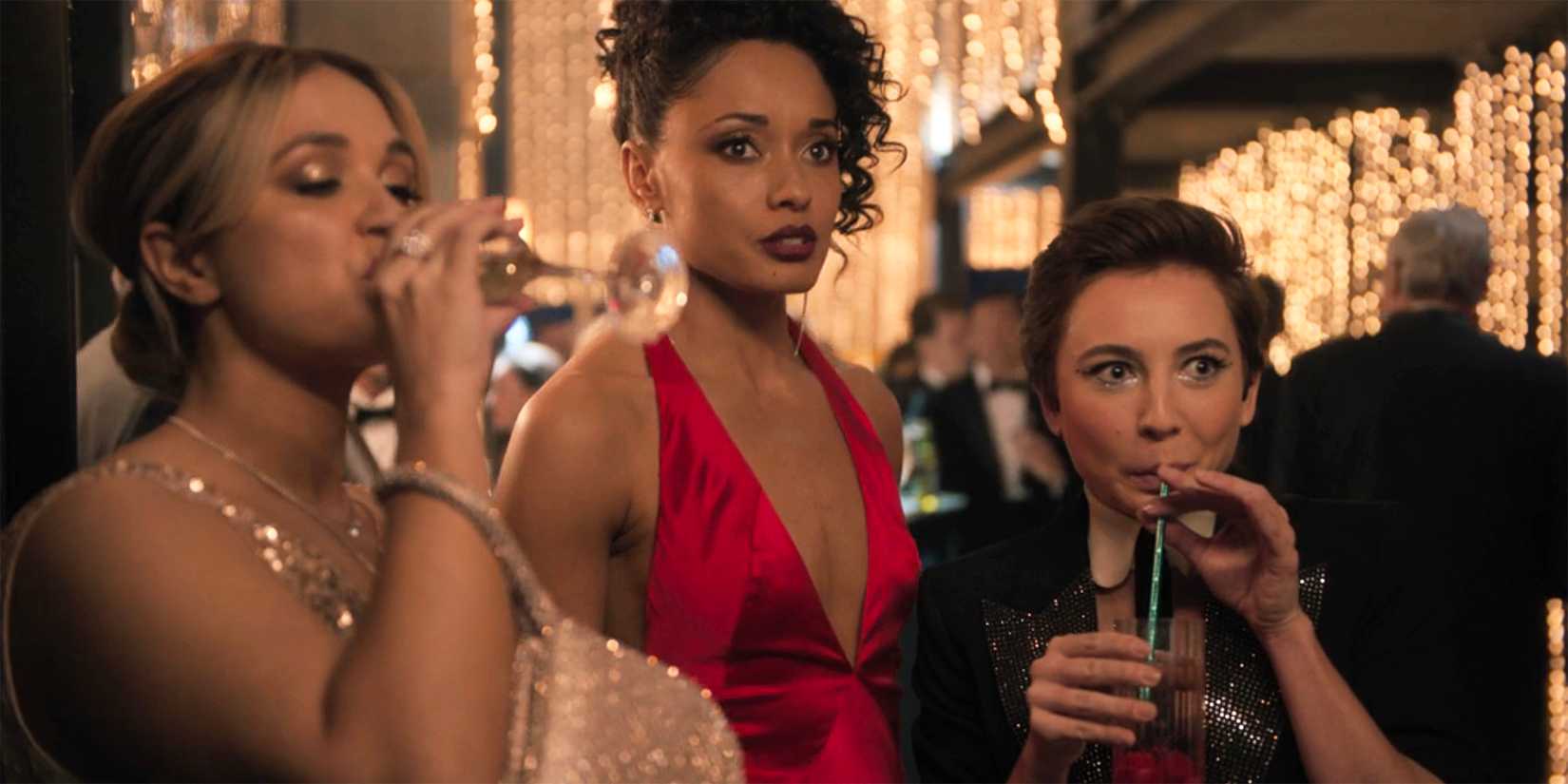 Evie and Blue drink cocktails while Mackey looks on in NCIS Sydney