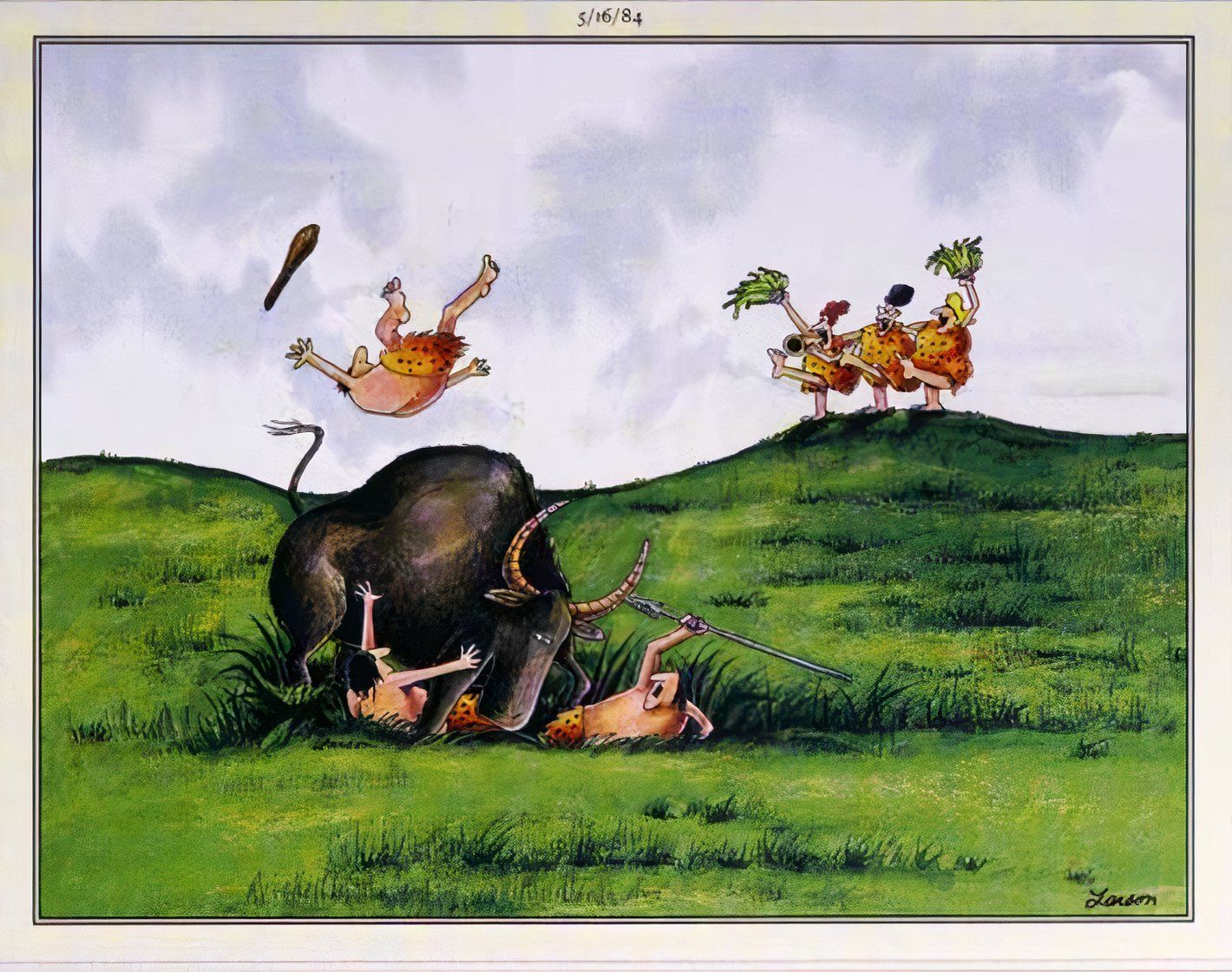 Far Side, May 16, 1984, cavewoman cheerleaders perform on a hill as cavemen fight an animal