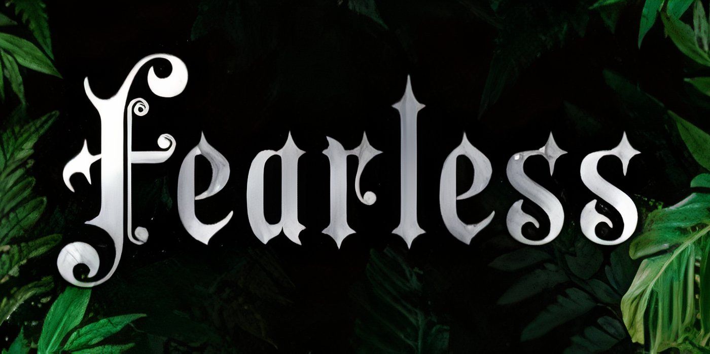 The preliminary cover of Fearless by Lauren Roberts with the title in silver, a black background and green leaves
