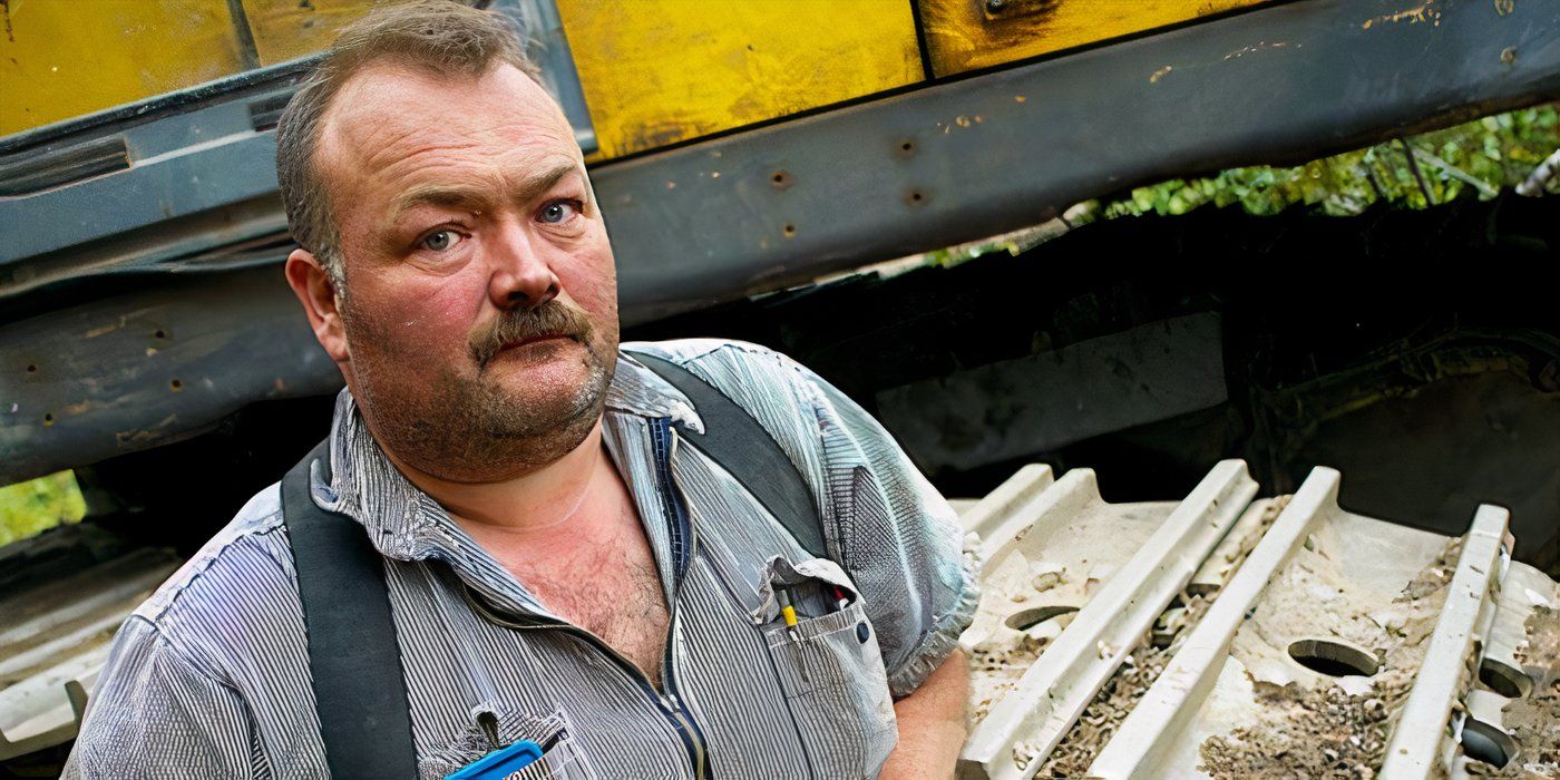 Gene Cheeseman standing next to an excavator in Gold Rush.