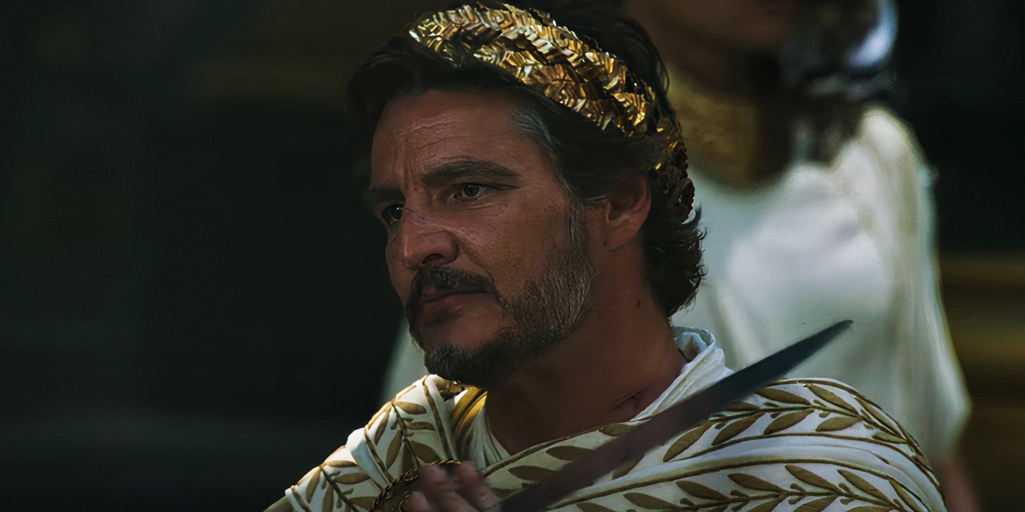 Pedro Pascal's Marcus Acacius faces the emperor with a blade held to his neck