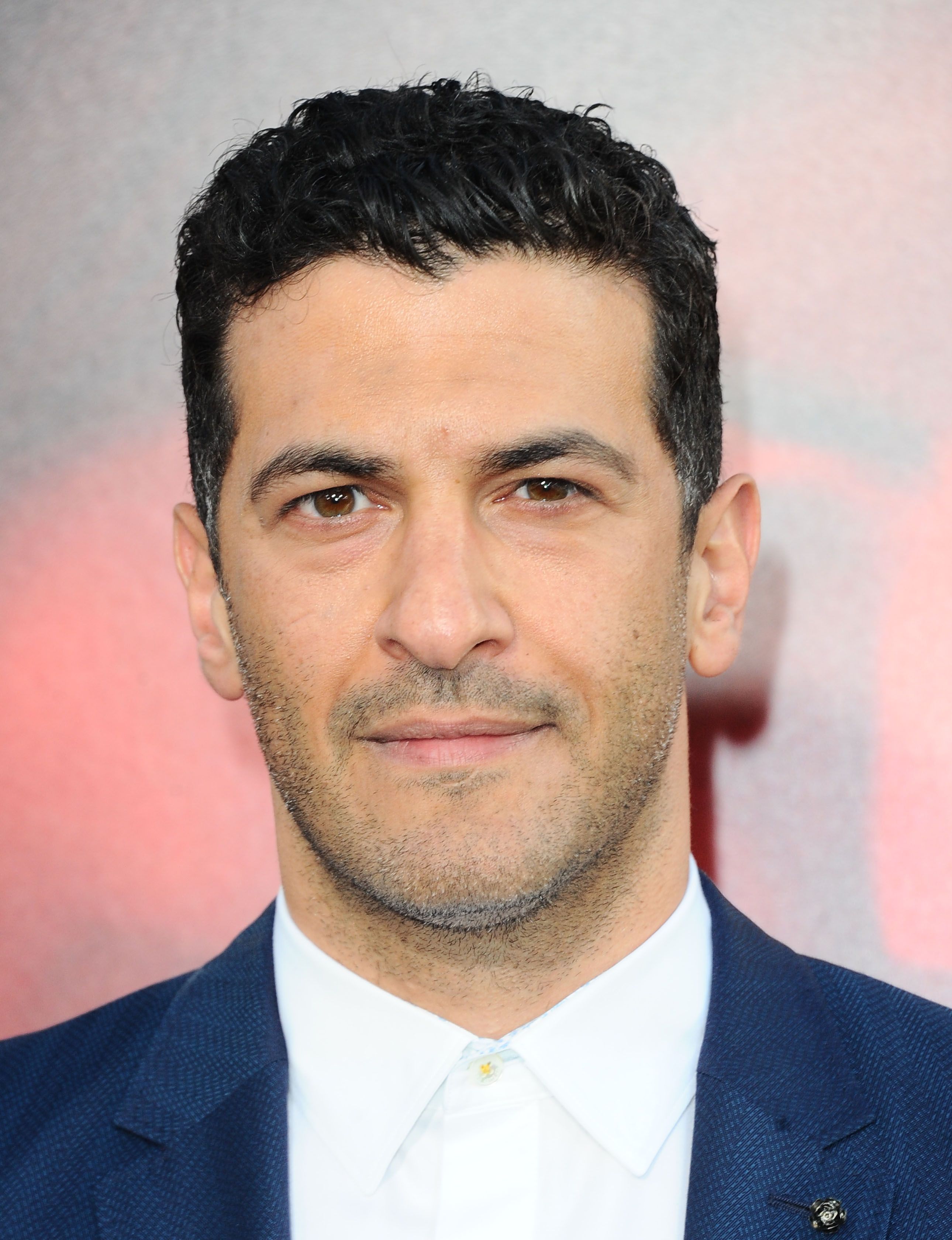 Headshot Of Simon Kassianides