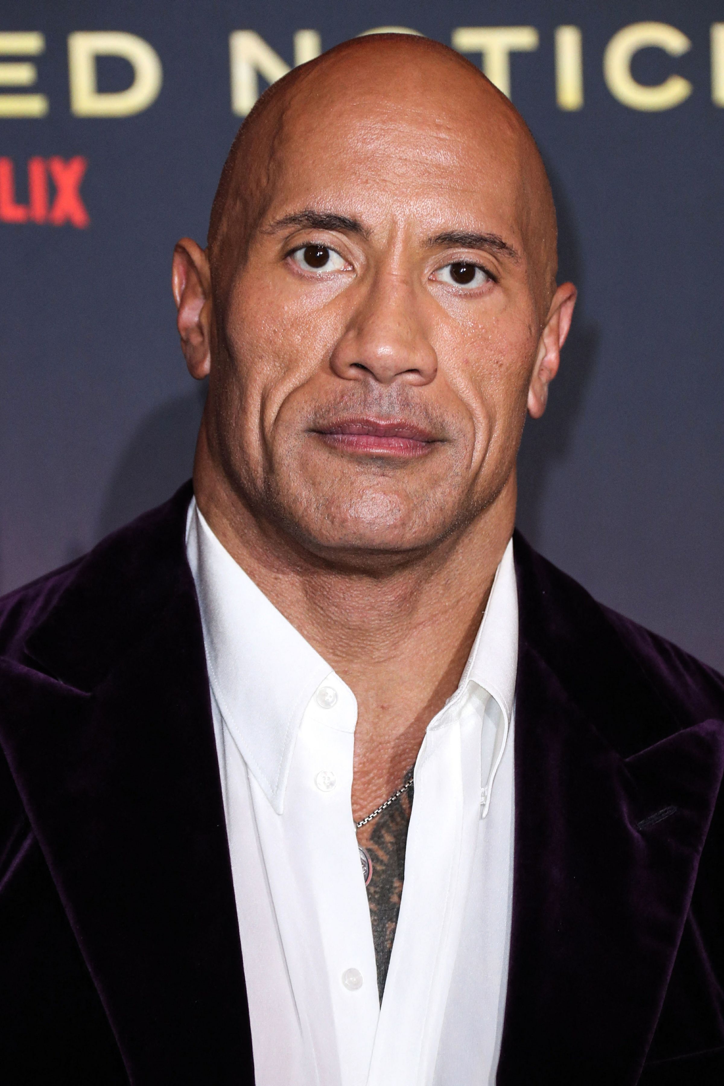 Portrait photo of Dwayne Johnson at the premiere of “Red Notice”