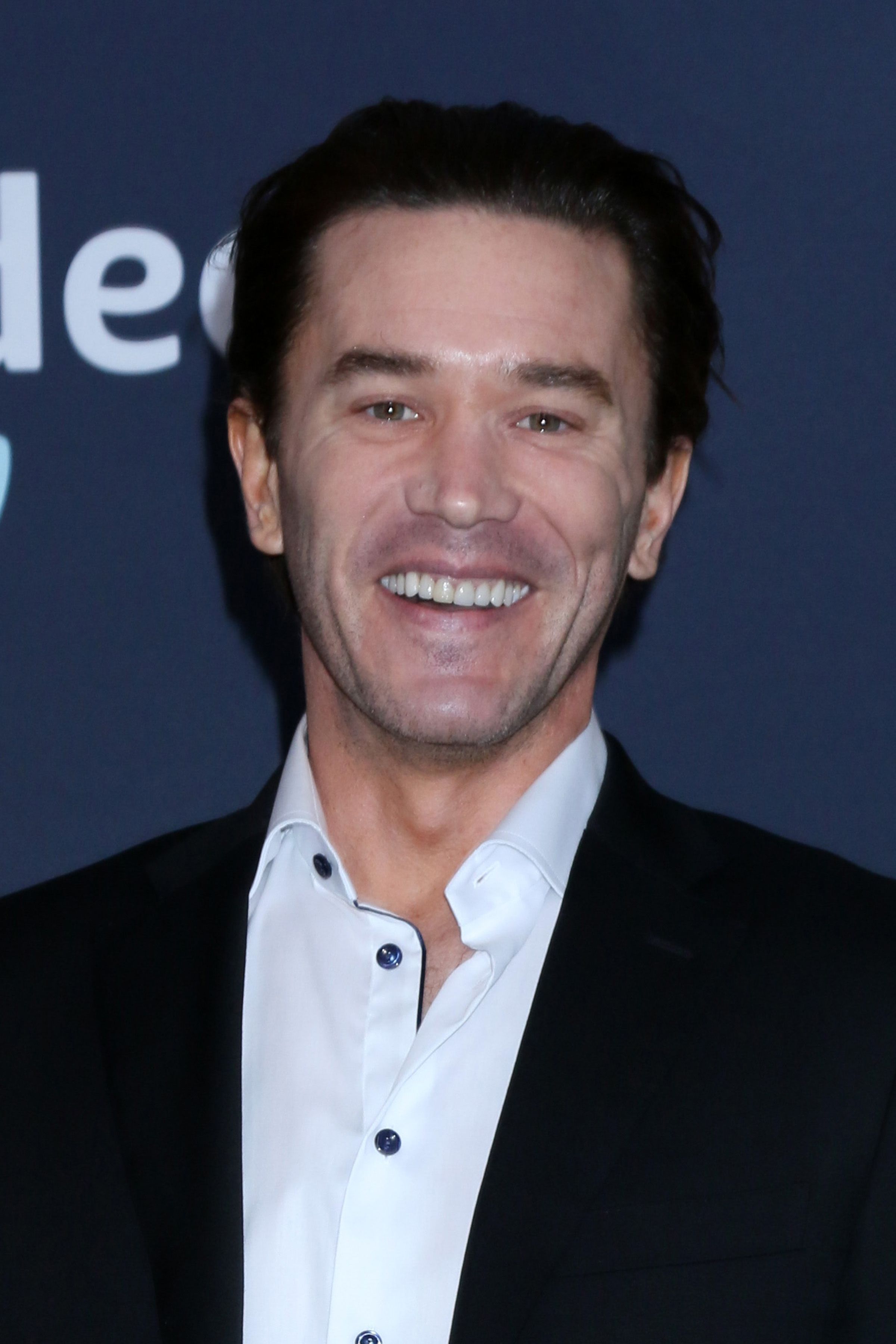 Headshot Of Tom Pelphrey IN The 2022 Academy of Country Music Awards at Allegient Stadium