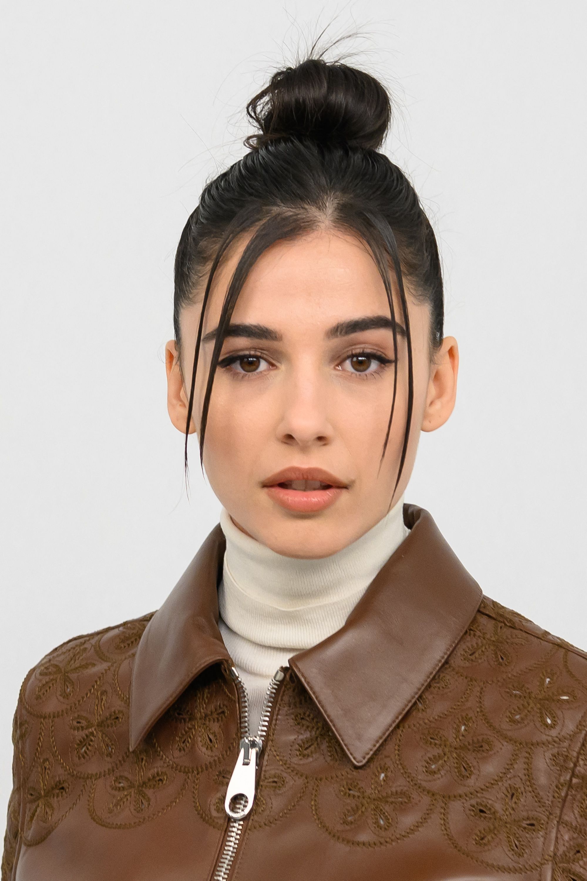 Naomi Scott's head at Paris Fall Fashion Week/Winter 2023