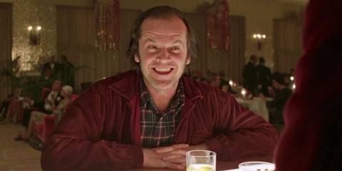 Jack smiling as he gets a drink in The Shining
