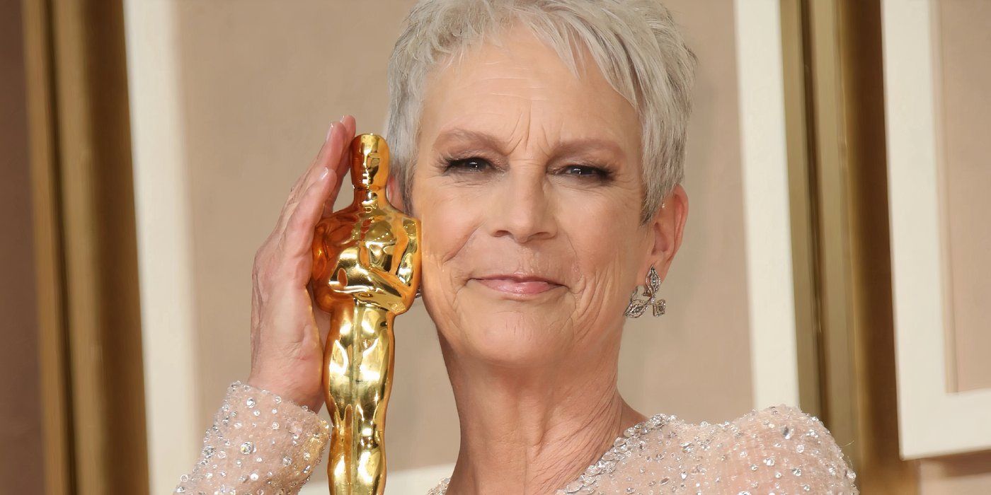 Jamie Lee Curtis Posing With Oscar And Smiling