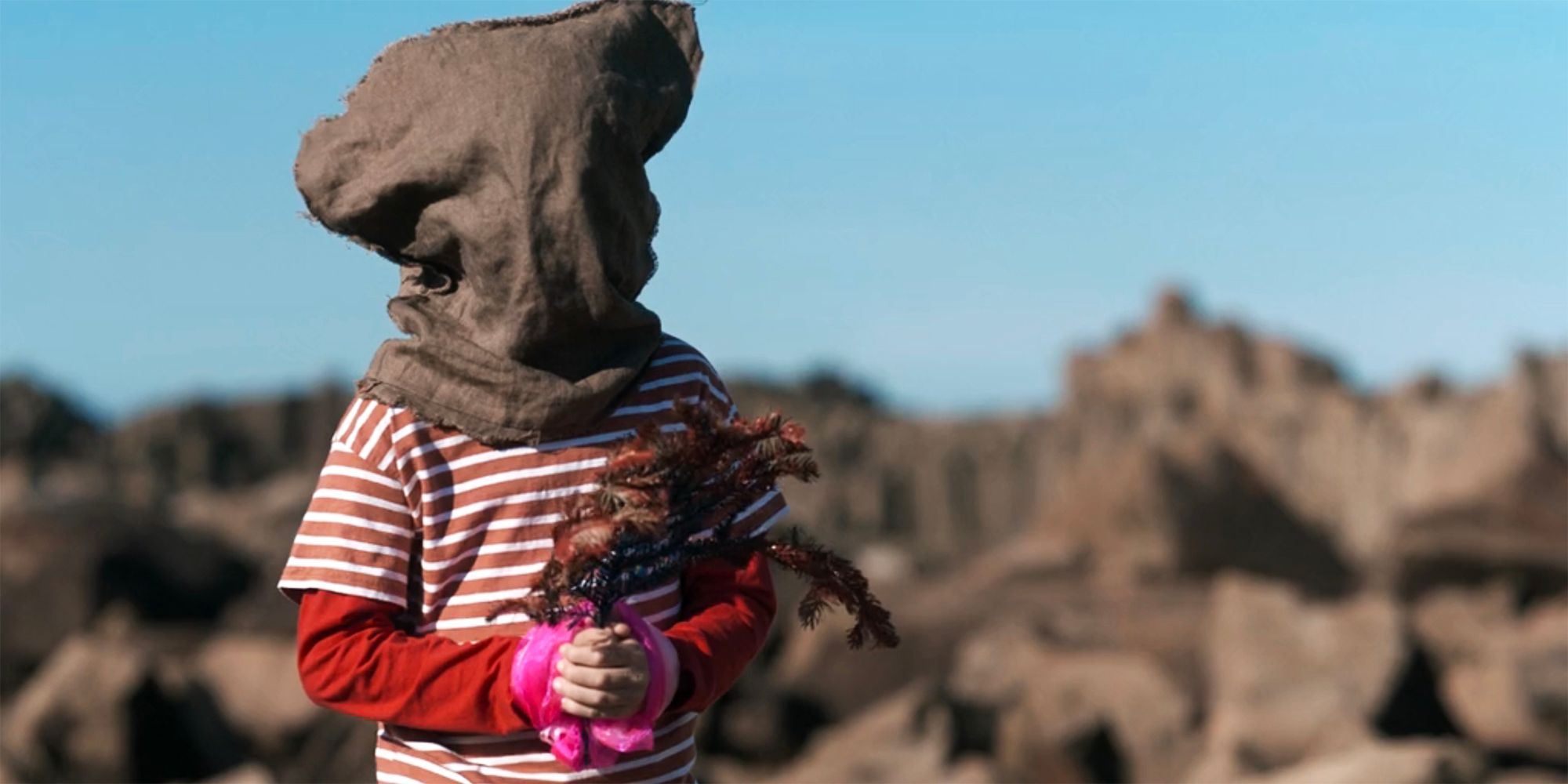 JD's son Jack with a sack over his head and his hands tied in NCIS Sydney