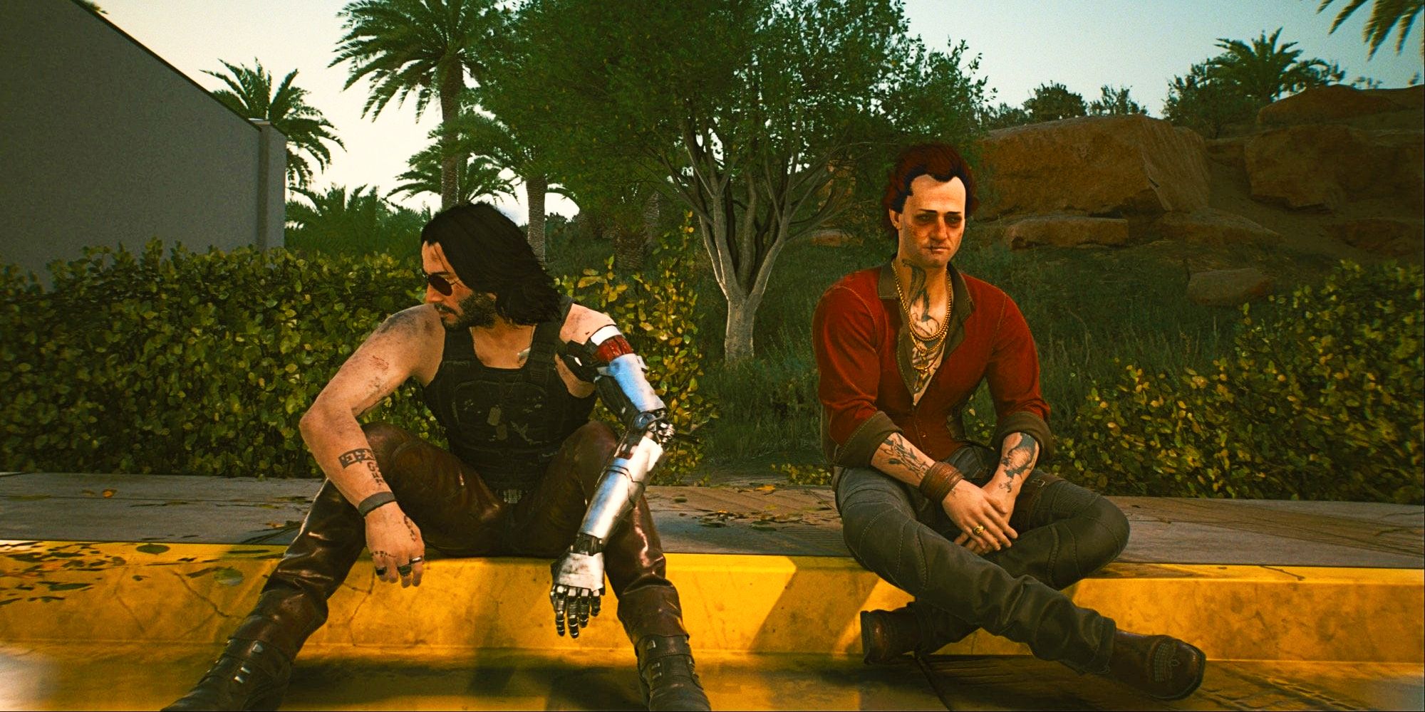 Johnny y Henry están sentados al borde en una captura de pantalla de Cyberpunk 2077.