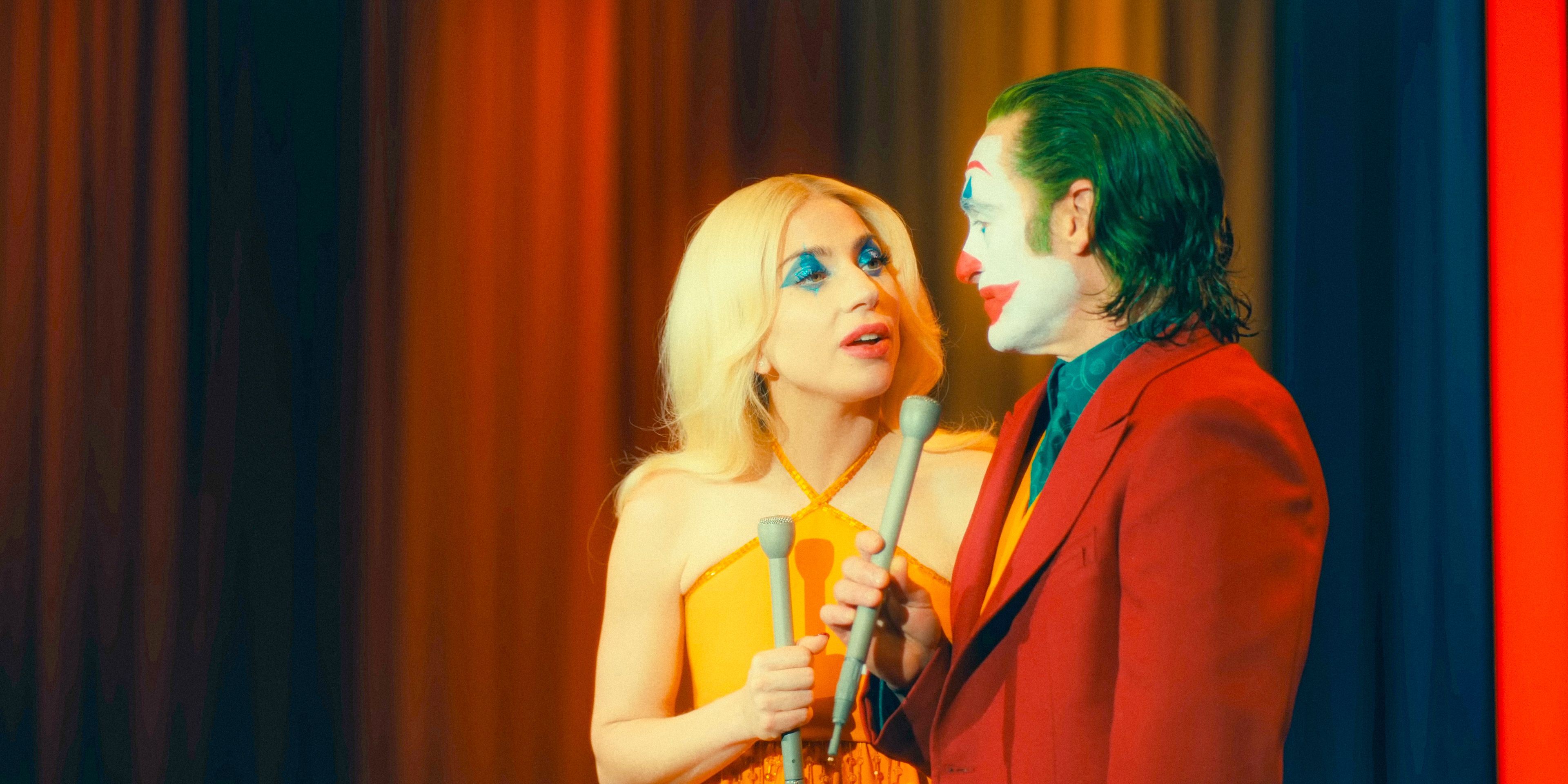 Harley Quinn (Lady Gaga) and Joker (Joaquin Phoenix) hosting their show in Joker: Folie à Deux