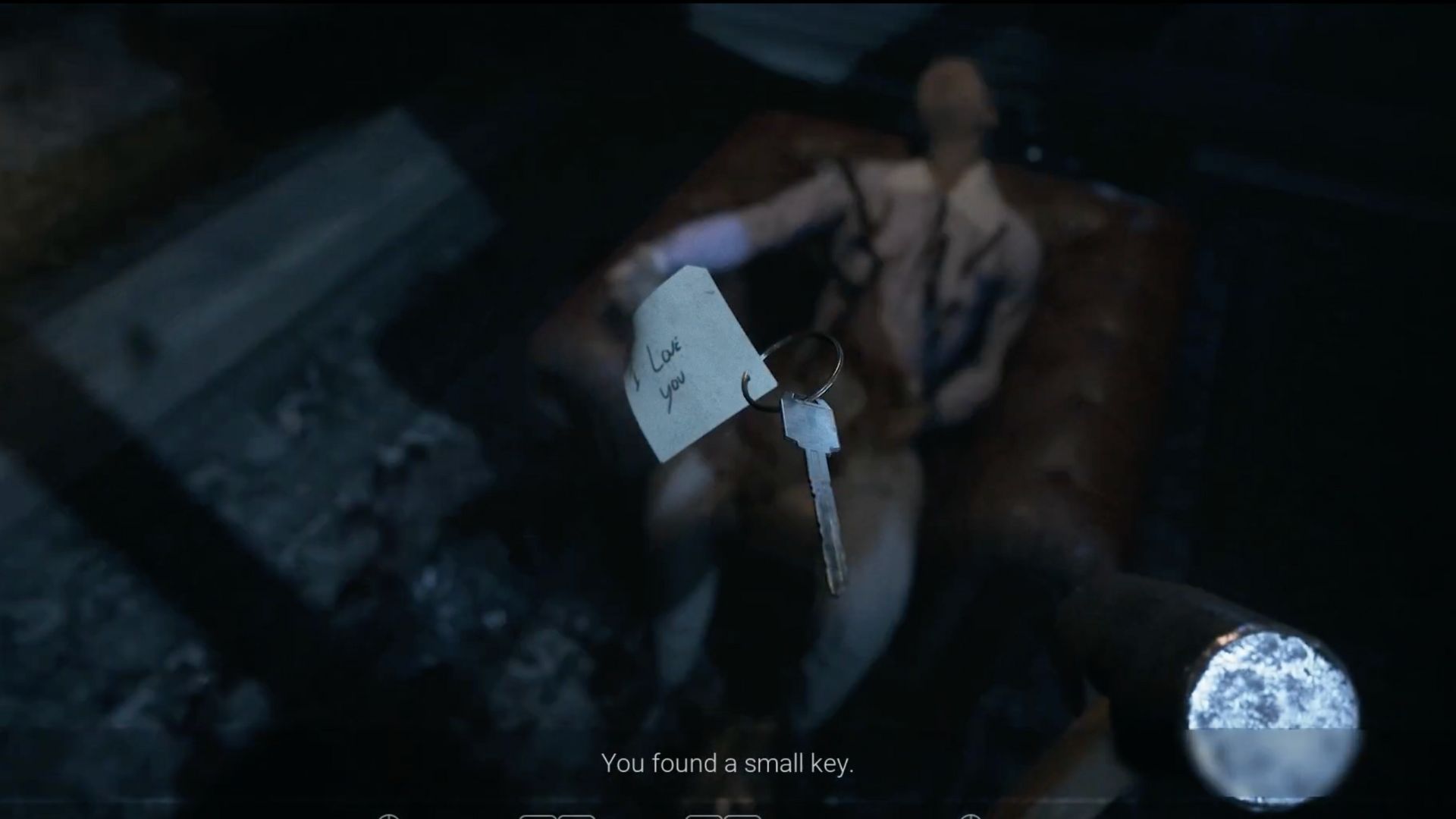 Key that says I love you over George's corpse in Visage