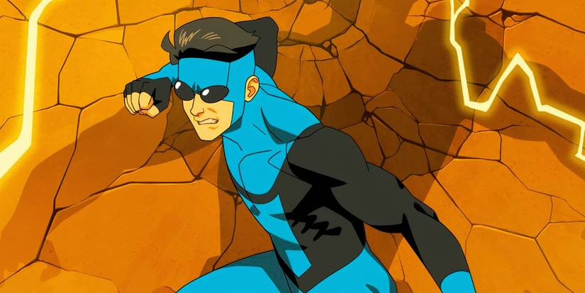 Mark Grayson (Steven Yeun) wears a blue and black suit in an Invincible promo image