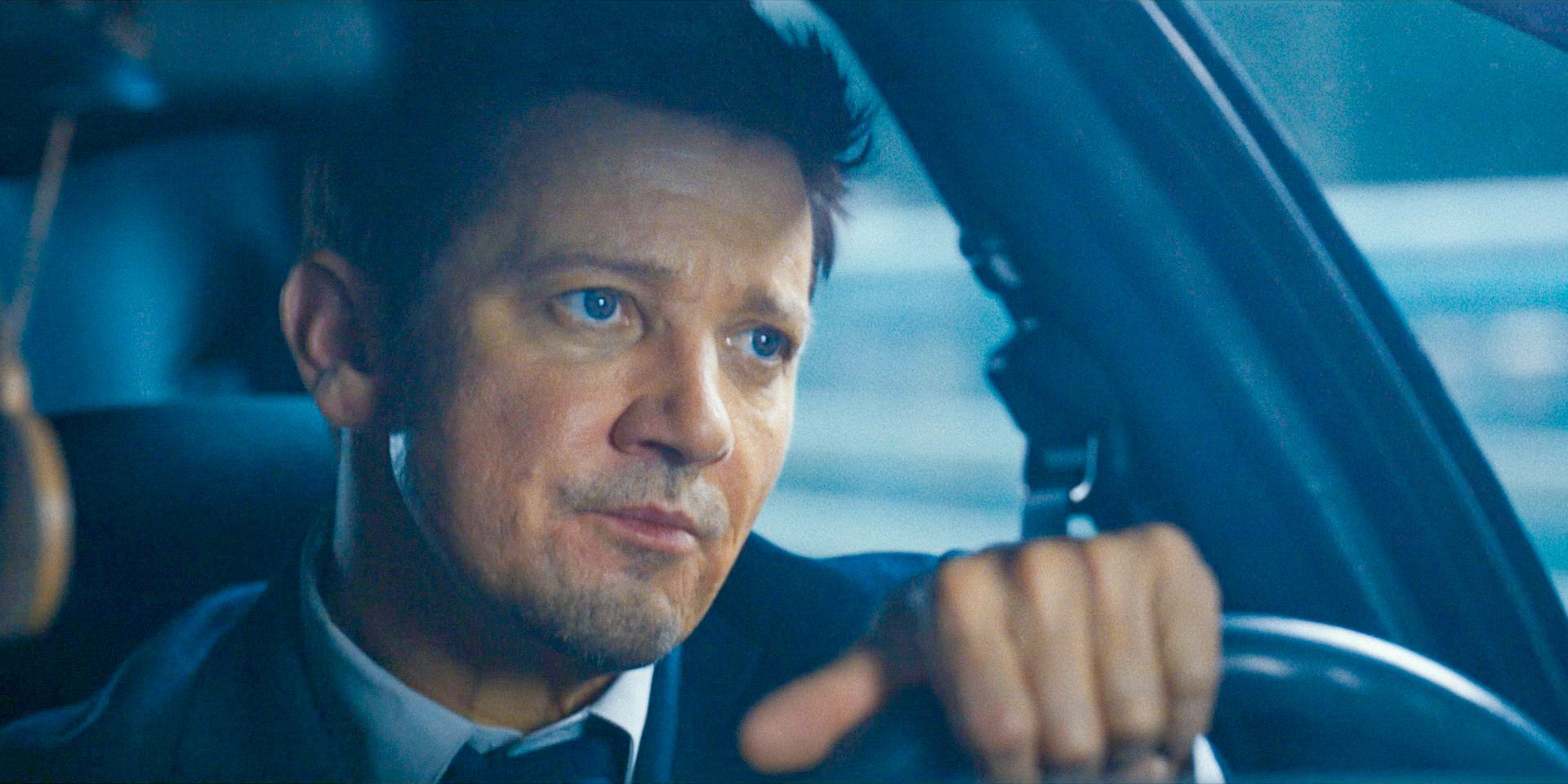 Mike (Jeremy Renner) thoughtful while driving in Mayor of Kingstown Season 3 Episode 9