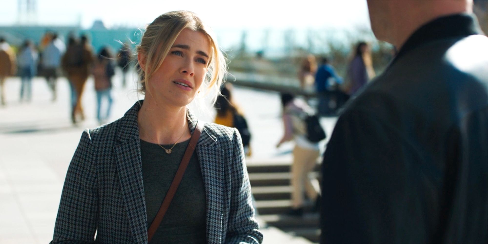 Melissa Roxburgh as Dory Shaw standing on the campus in Tracker