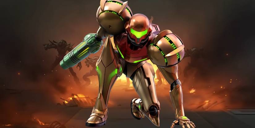 Image of Metroid Prime Remastered's Samus crouched on one knee with an explosion in the background from Metroid Prime 4​​​​​​​.