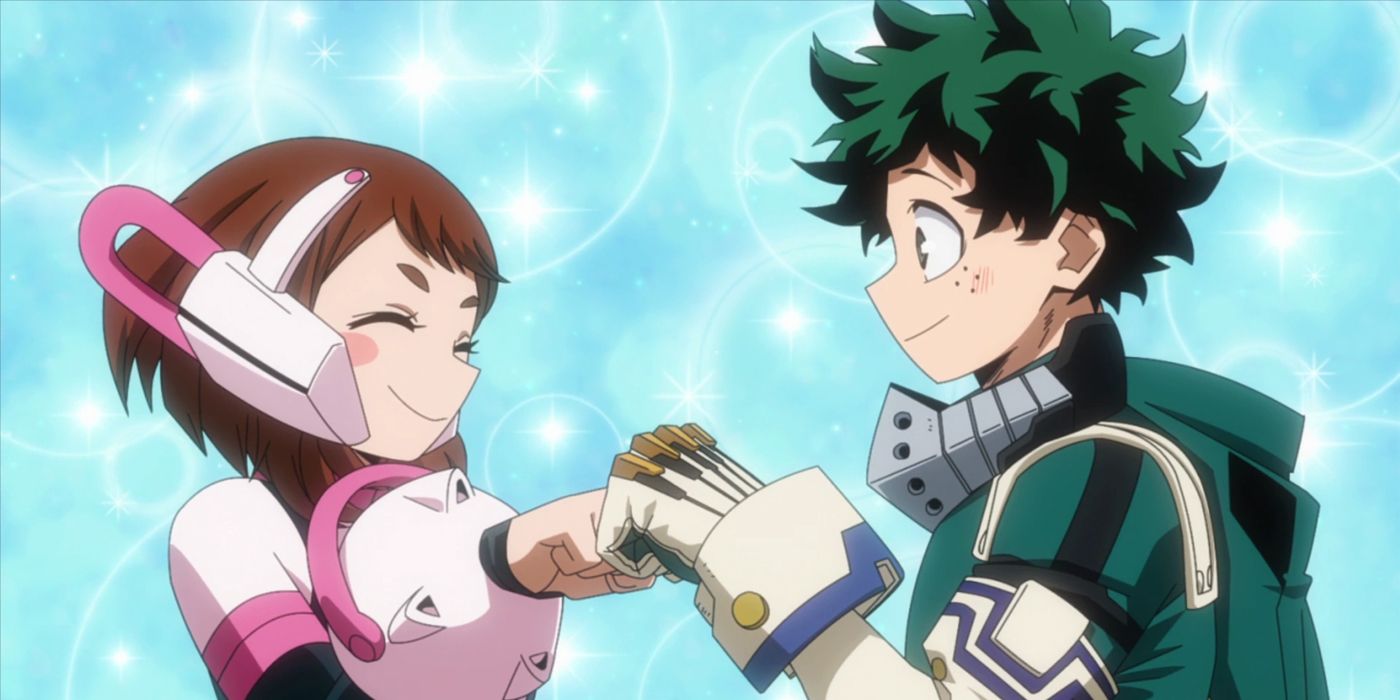 Ochaco e Deku sorriem e tocam os punhos.