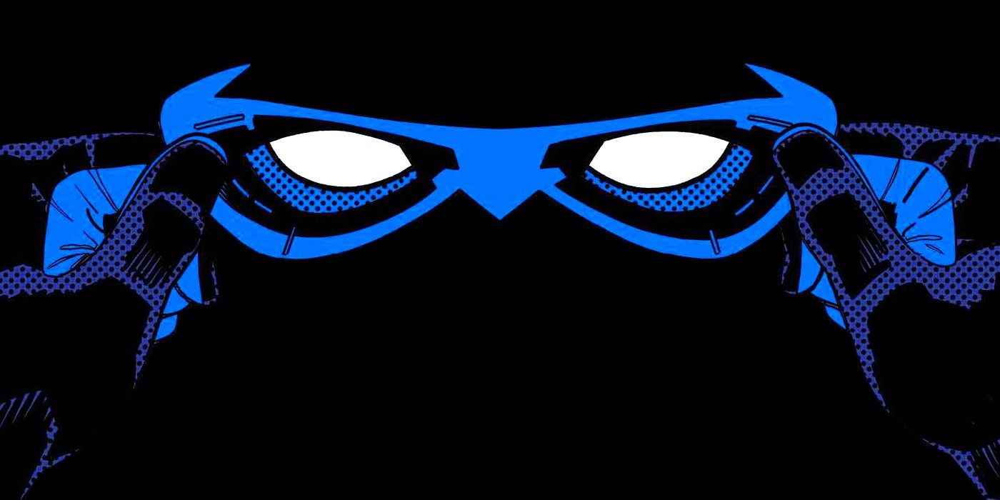 nightwing holding his mask 2