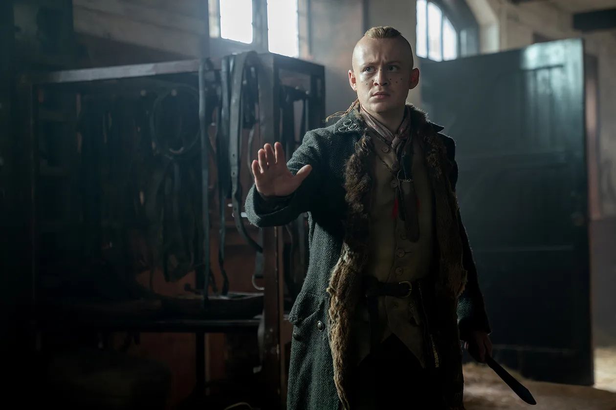 Young Ian looking cautious in Outlander season 7 part 2