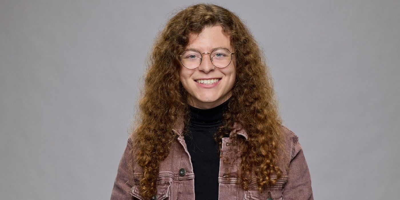 Quinn Martin from Big Brother 26 posing in front of a gray background.