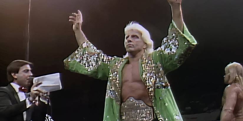 Ric Flair with his arms raised in ESPN's 30 for 30