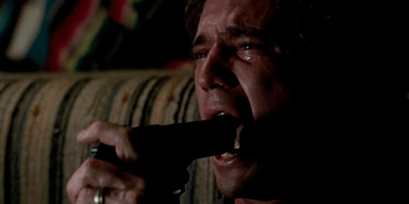 Riggs with a gun in his mouth in Lethal Weapon