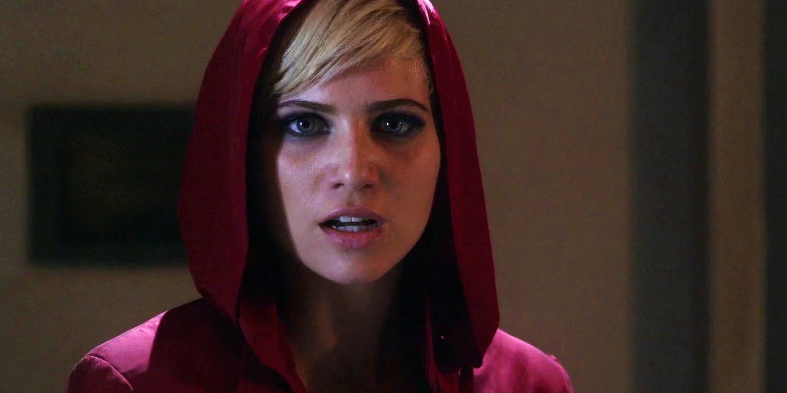 Sara Harvey wears a red coat in Pretty Little Liars